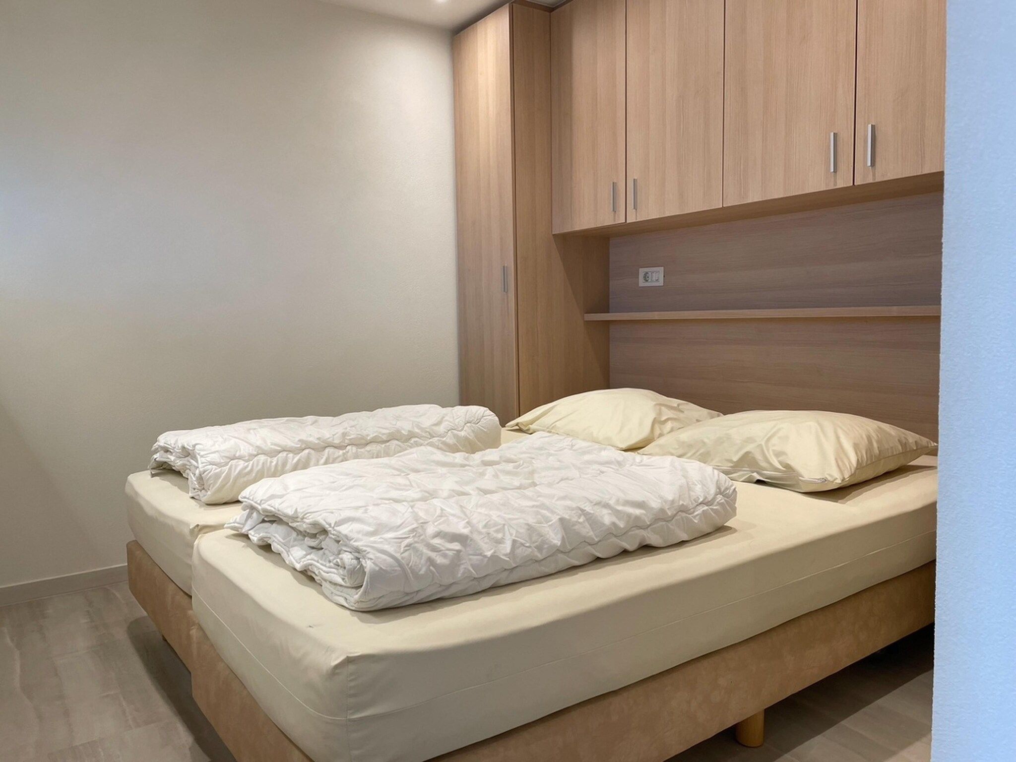 Een slaapkamer van Het Platte Putje - Huisdier - nr1 in Groede