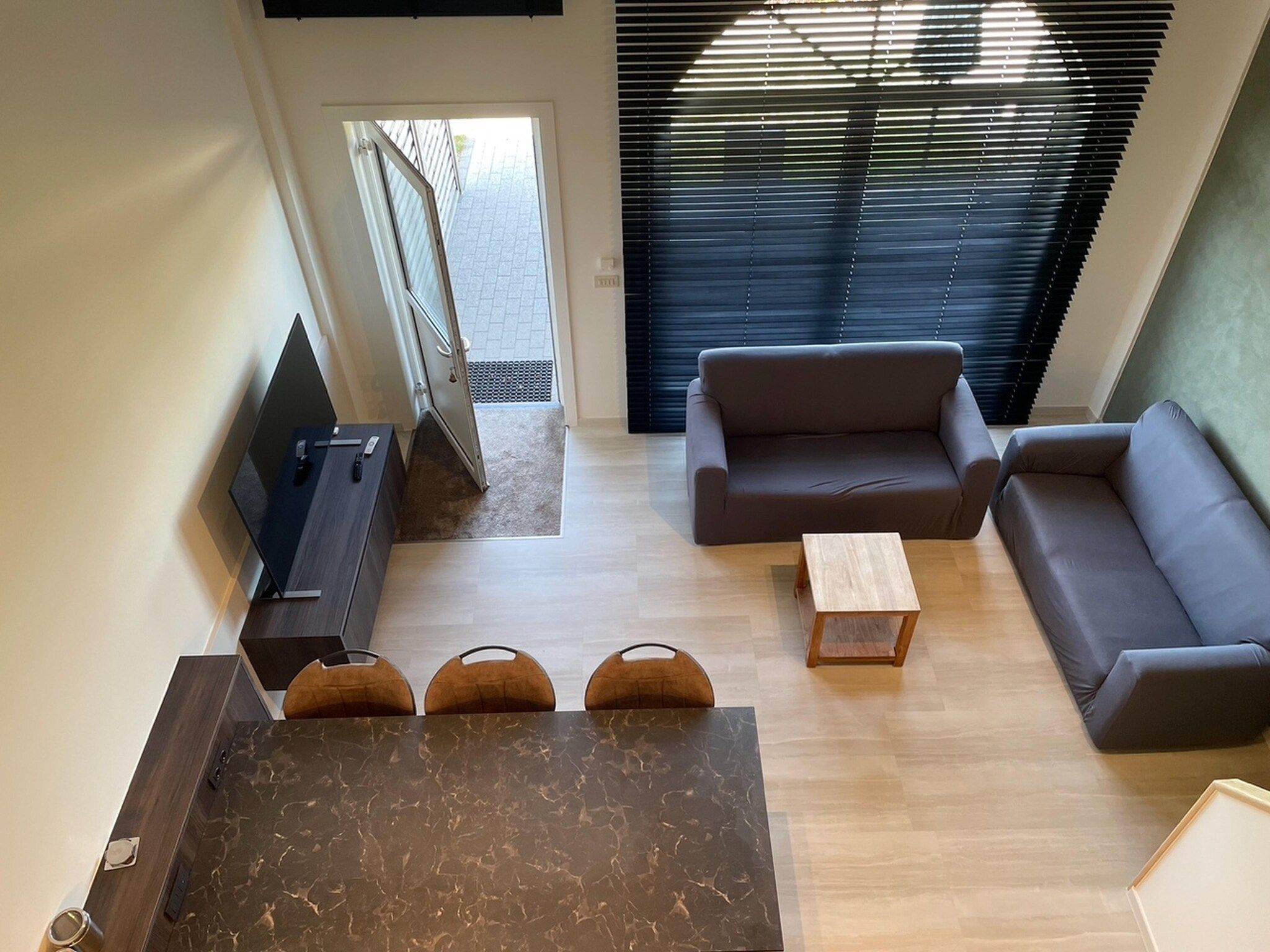 De woonkamer van Het Platte Putje - Huisdier - nr 2 in Groede