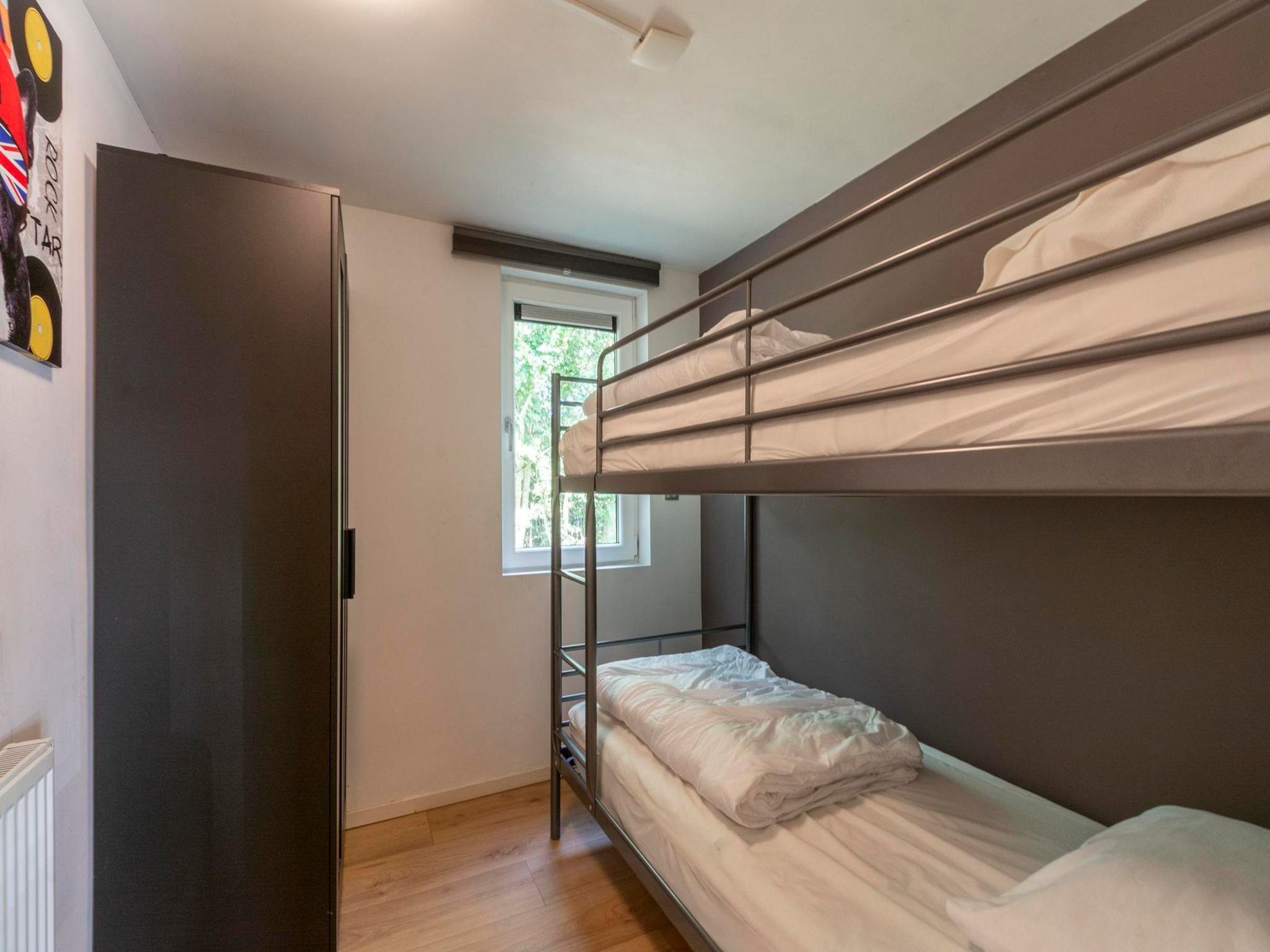 Een slaapkamer van Sandepark 118 in Groote Keeten