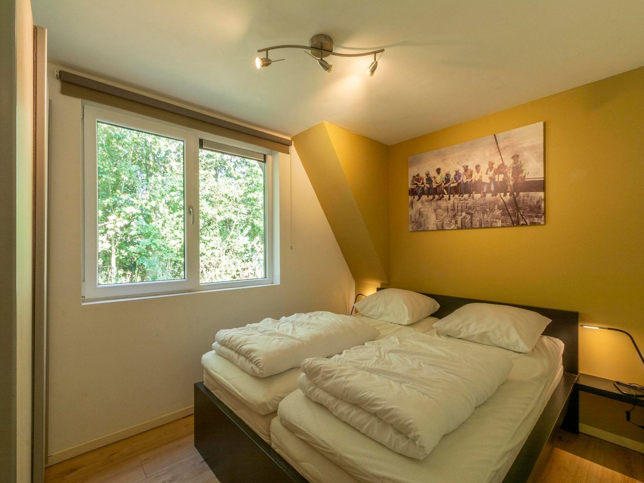 Een slaapkamer van Sandepark 118 in Groote Keeten