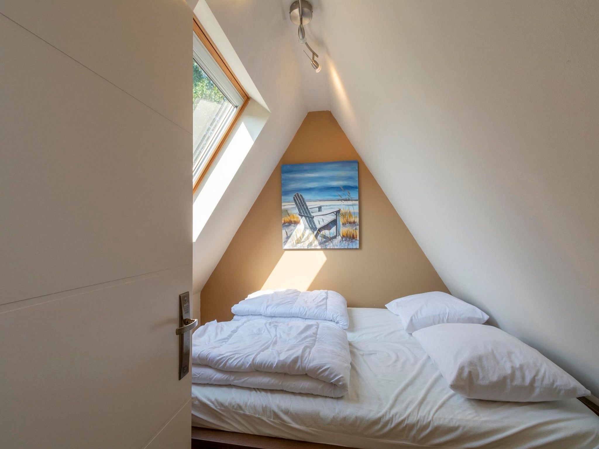 Een slaapkamer van Sandepark 118 in Groote Keeten