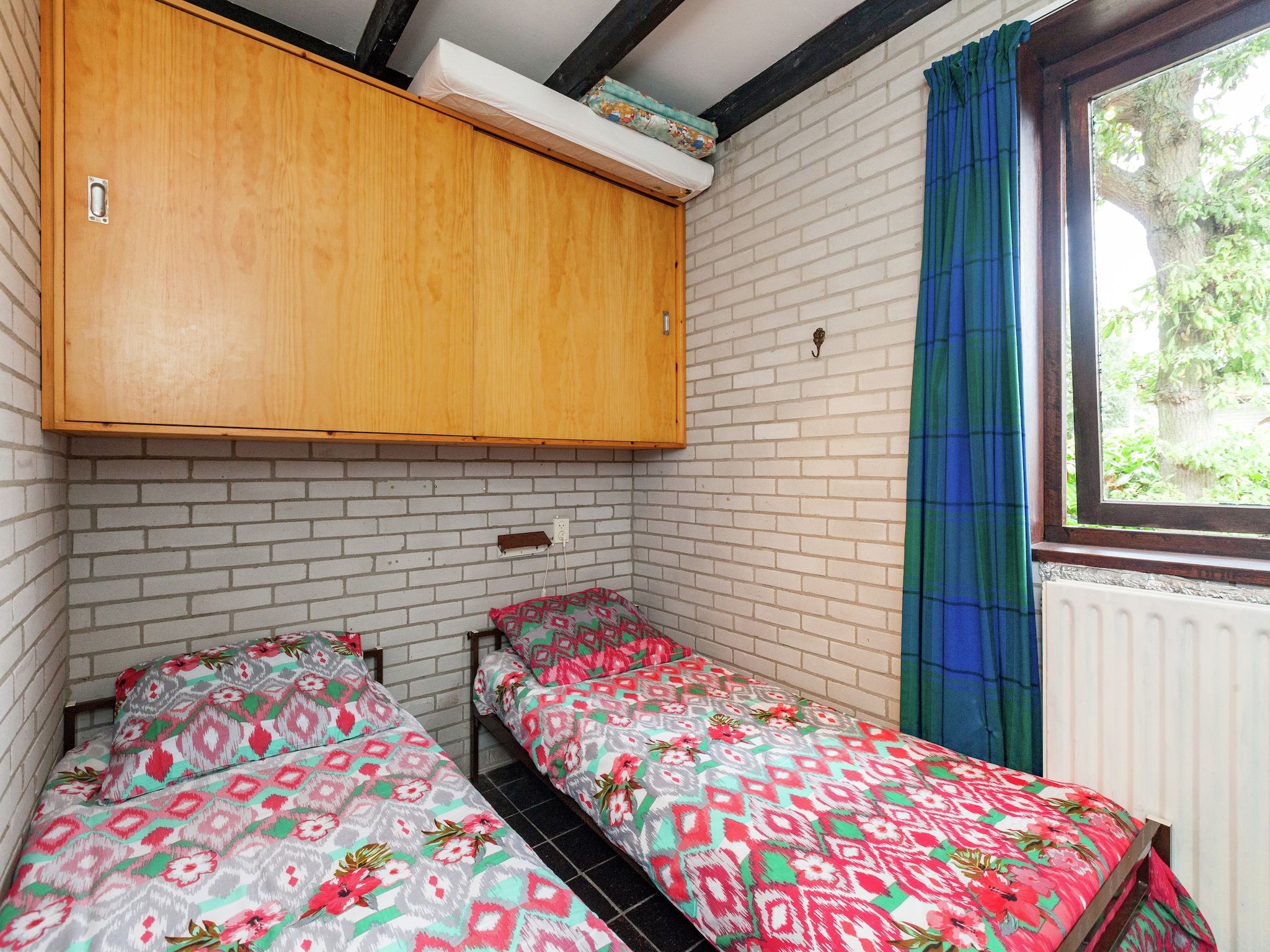 Een slaapkamer van De Nachtegaal - Veerse Meer in Kamperland