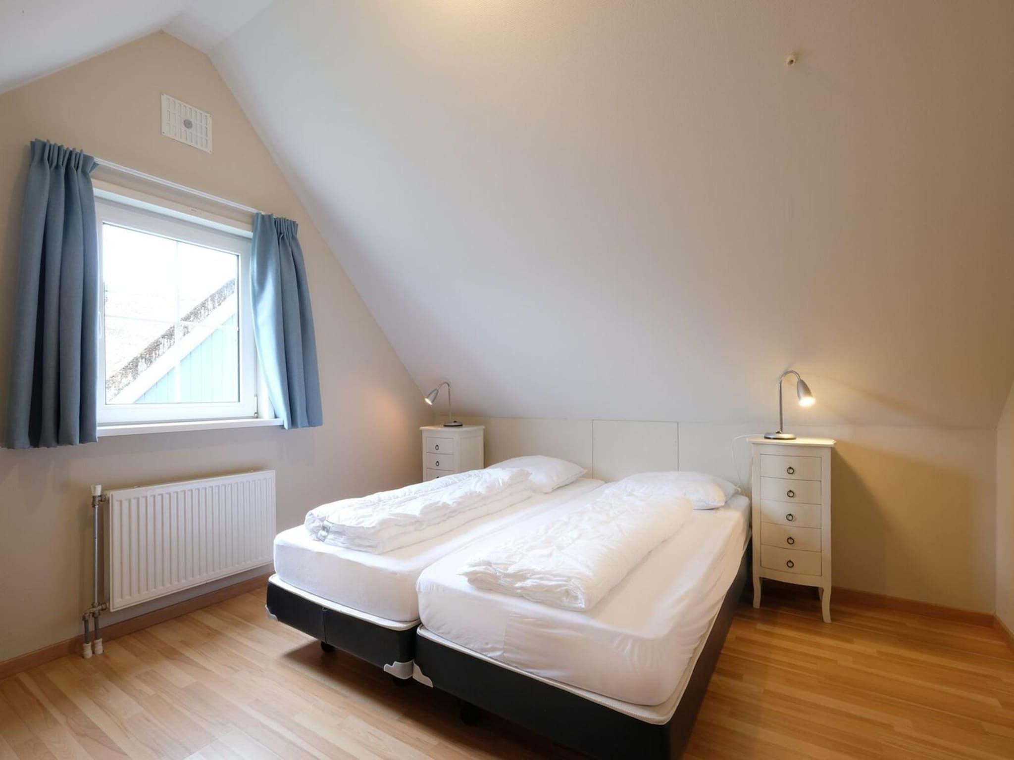 Een slaapkamer van Anzelhoef 2 in Sint Maartenszee