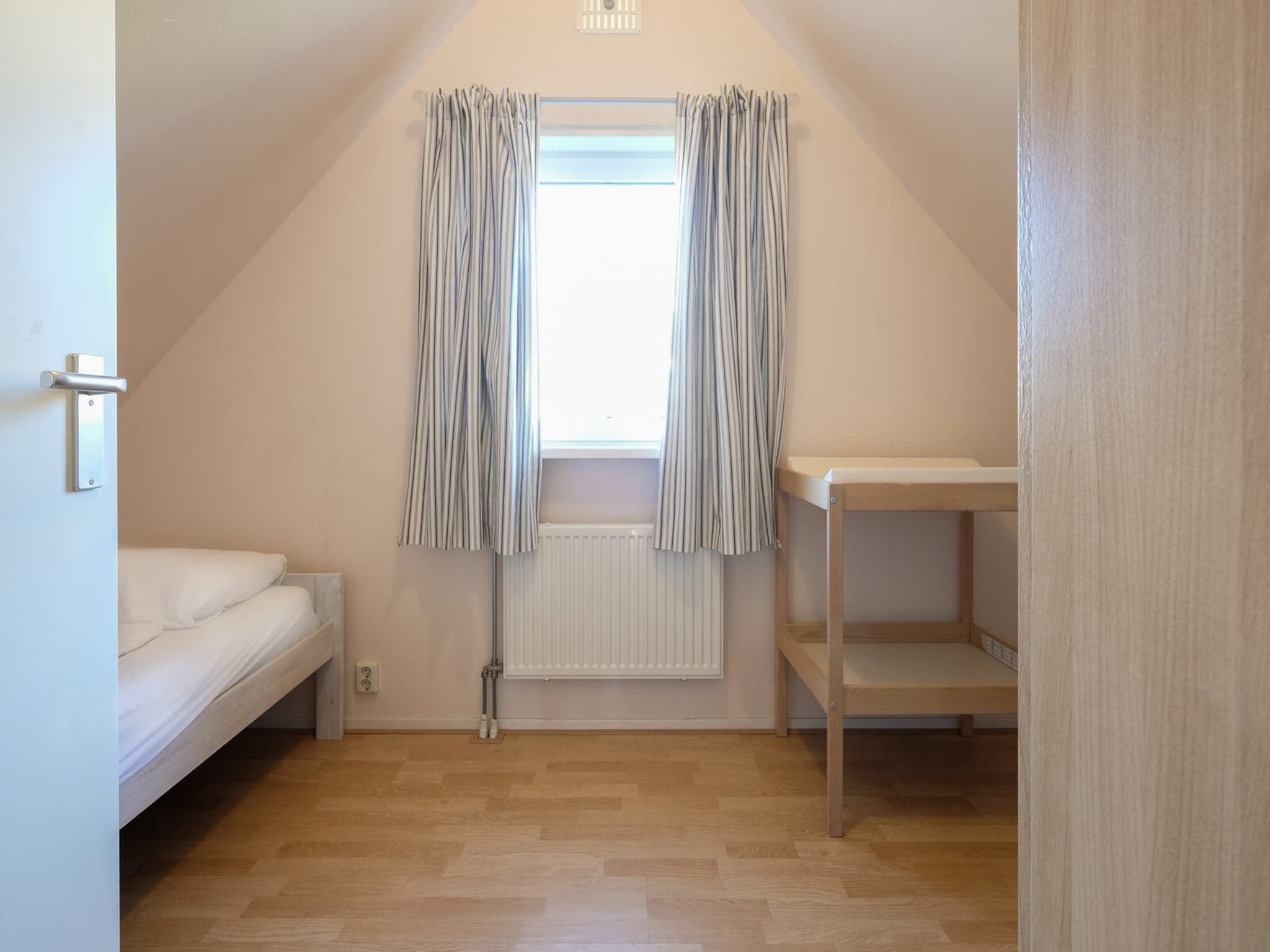 Een slaapkamer van Anzelhoef 5 in Sint Maartenszee