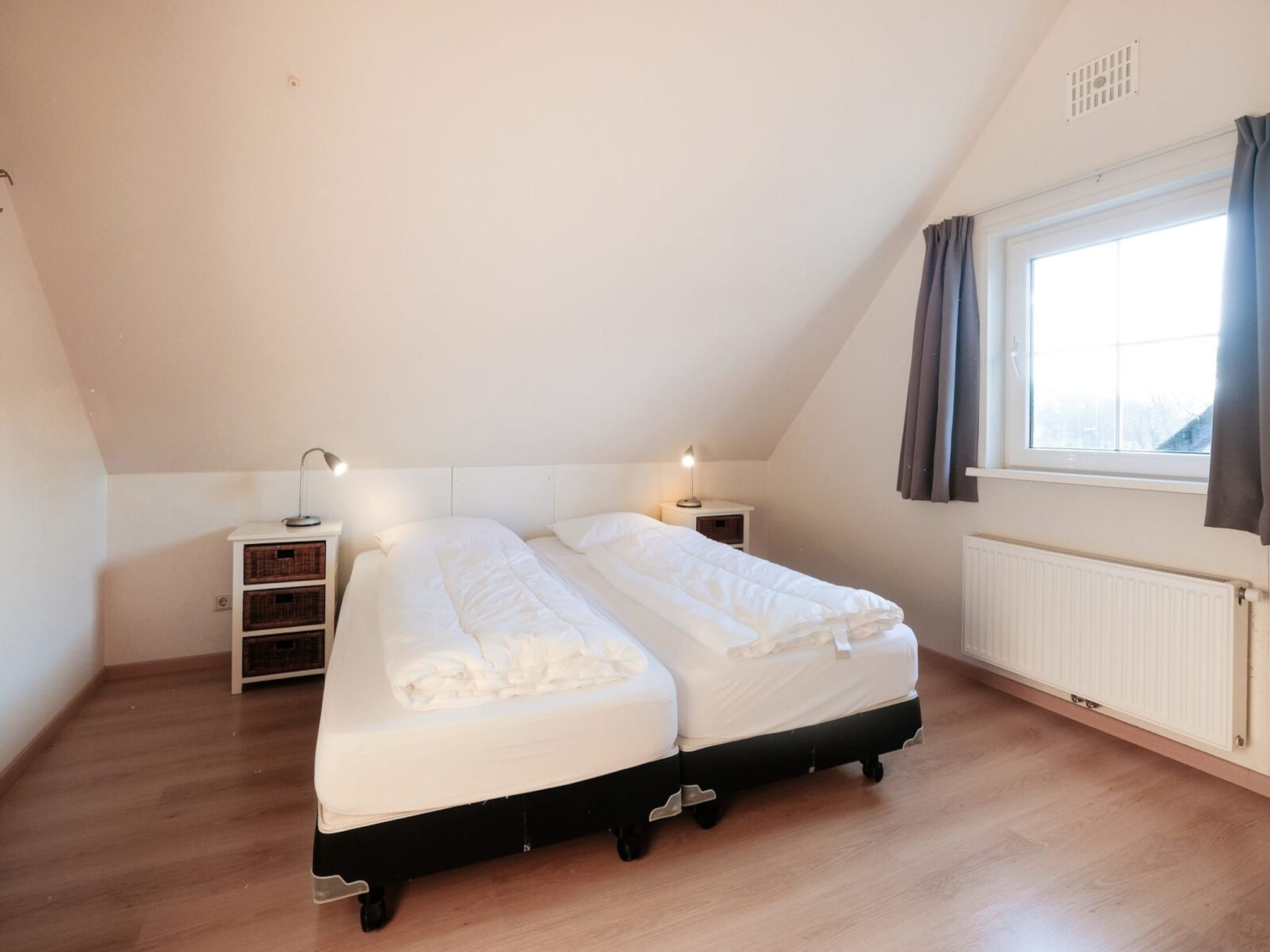 Een slaapkamer van Anzelhoef XL 19 in Sint Maartenszee