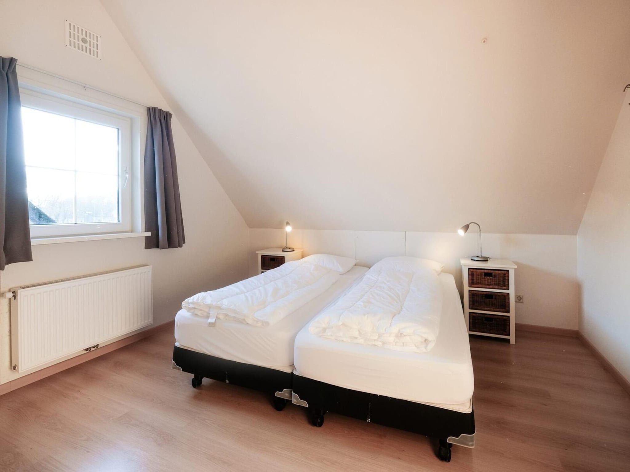 Een slaapkamer van Anzelhoef XL 19 in Sint Maartenszee