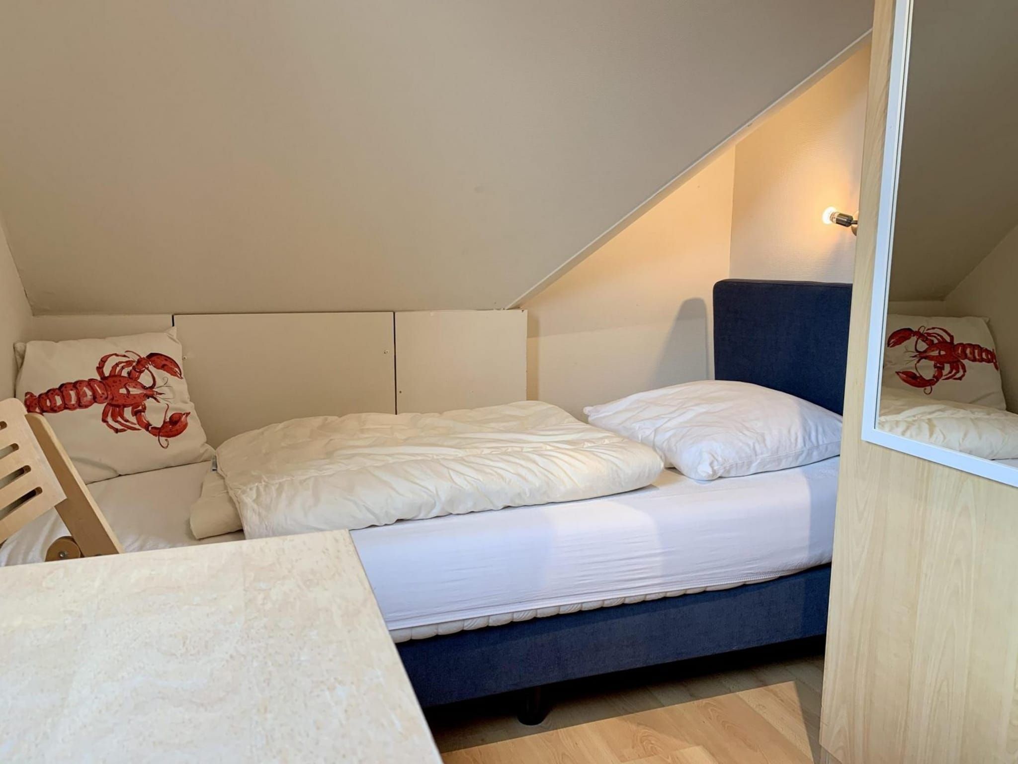 Een slaapkamer van Anzelhoef 25 in Sint Maartenszee