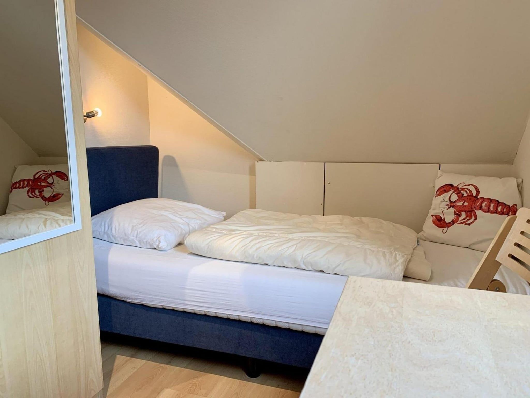 Een slaapkamer van Anzelhoef 25 in Sint Maartenszee