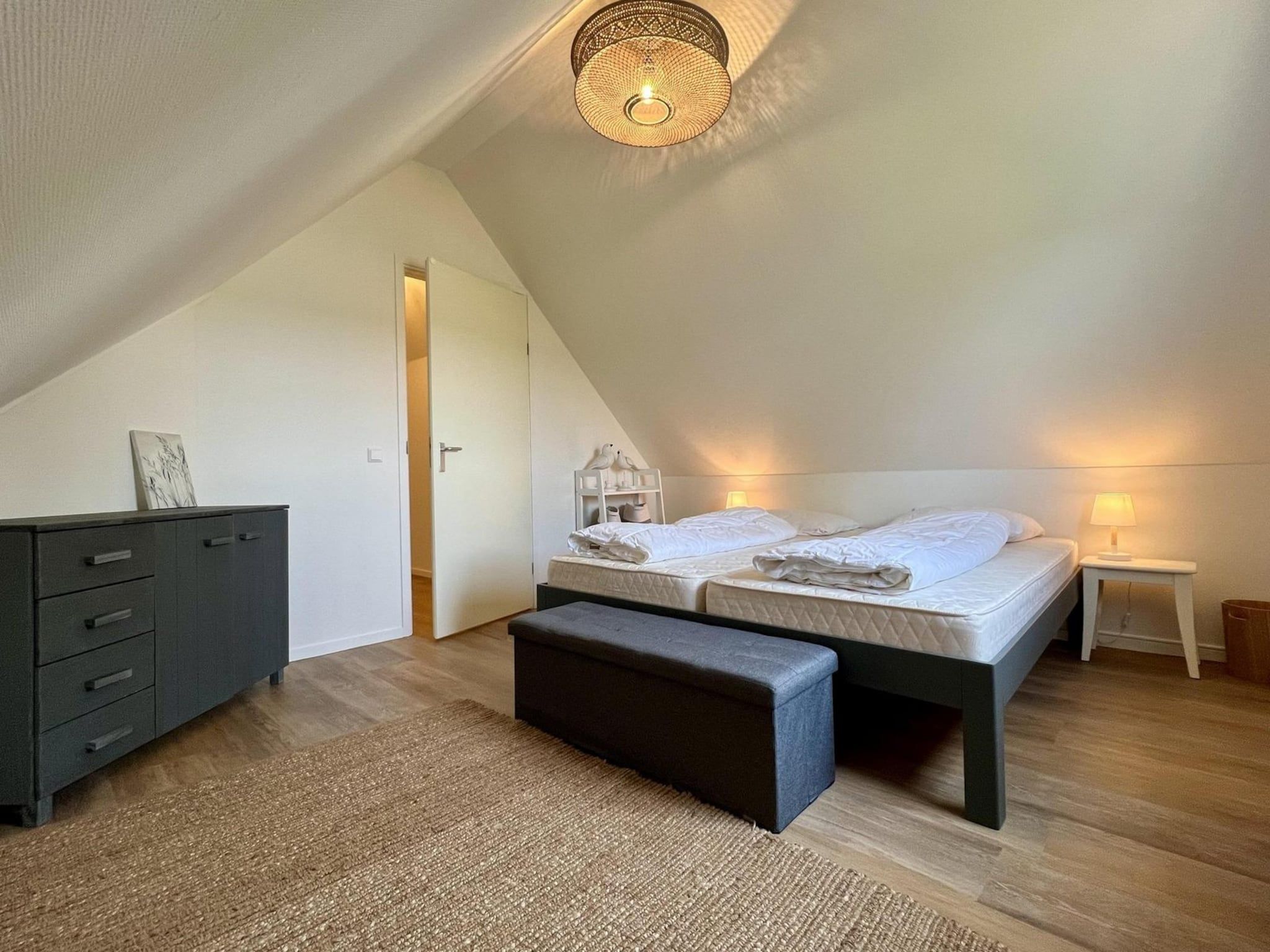Een slaapkamer van Anzelhoef 26 in Sint Maartenszee