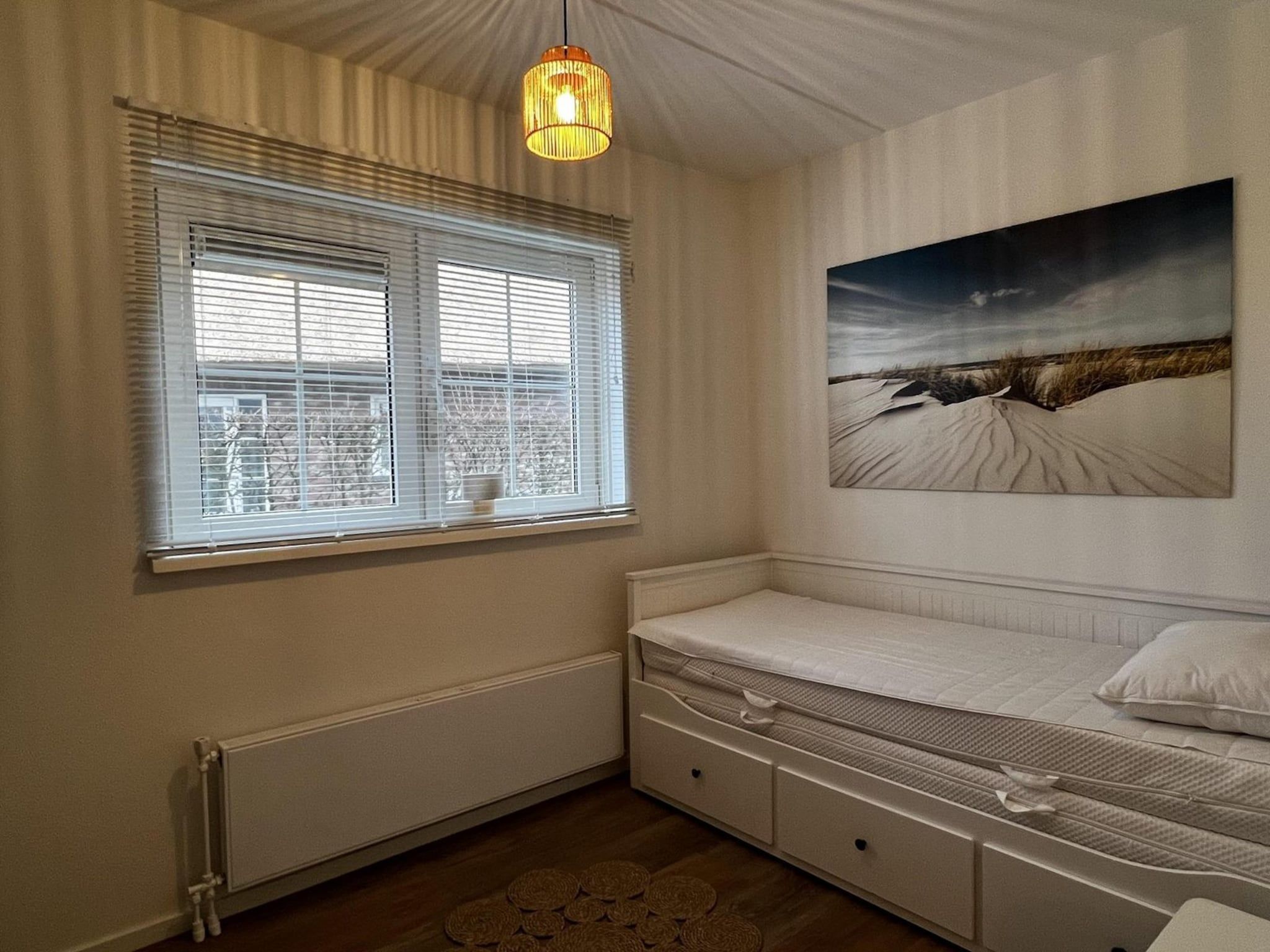 Een slaapkamer van Anzelhoef 26 in Sint Maartenszee