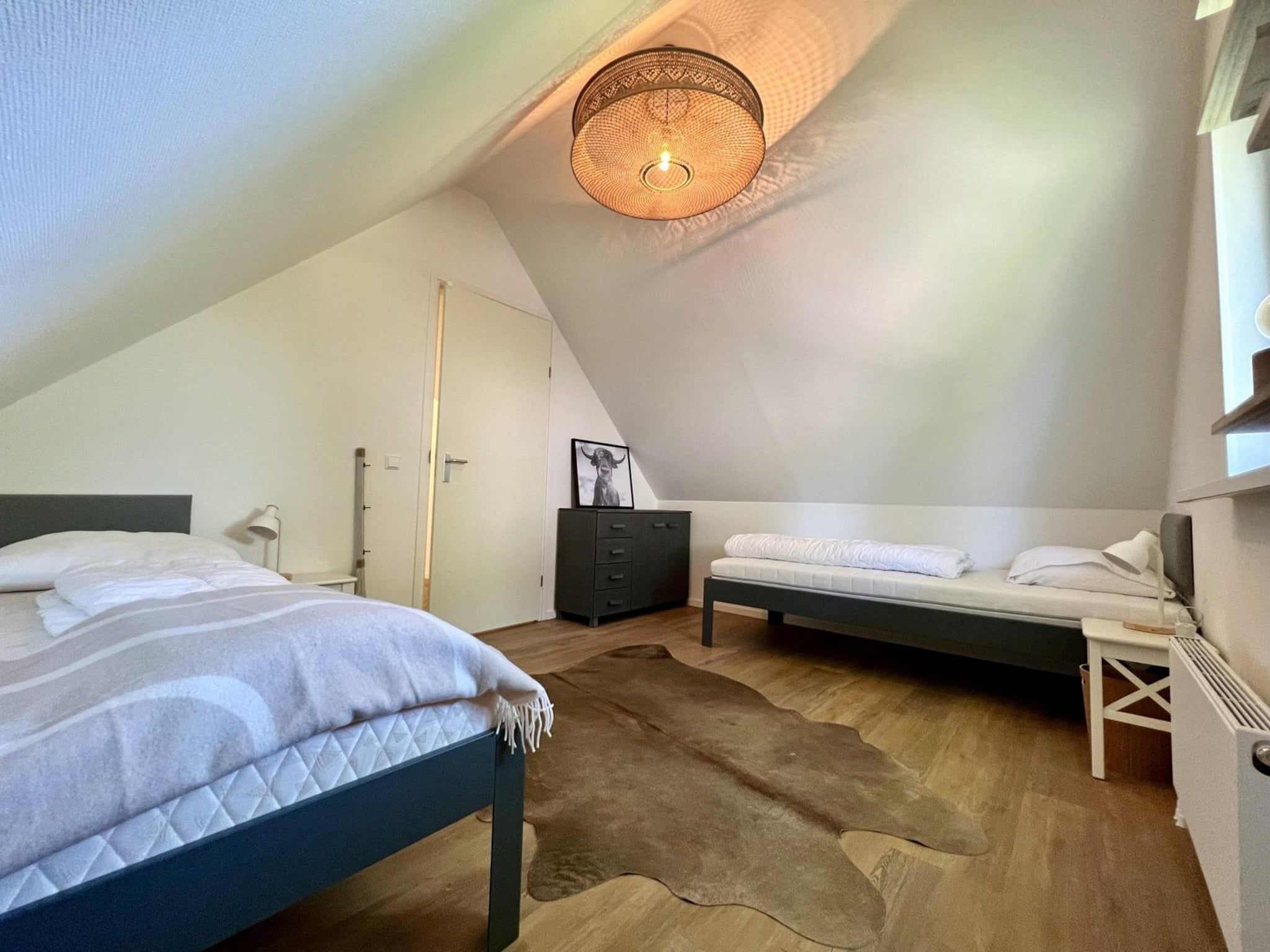 Een slaapkamer van Anzelhoef 26 in Sint Maartenszee