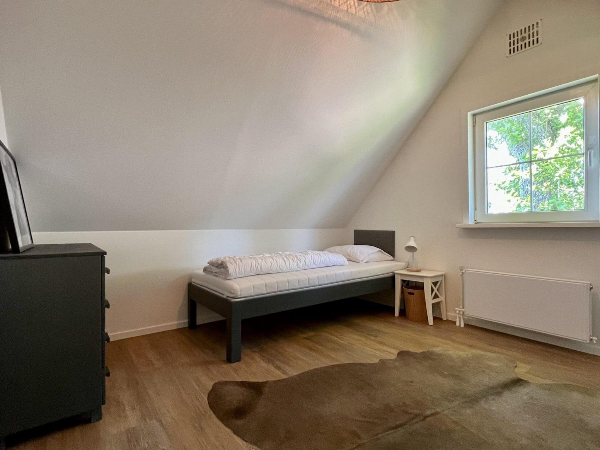 Een slaapkamer van Anzelhoef 26 in Sint Maartenszee