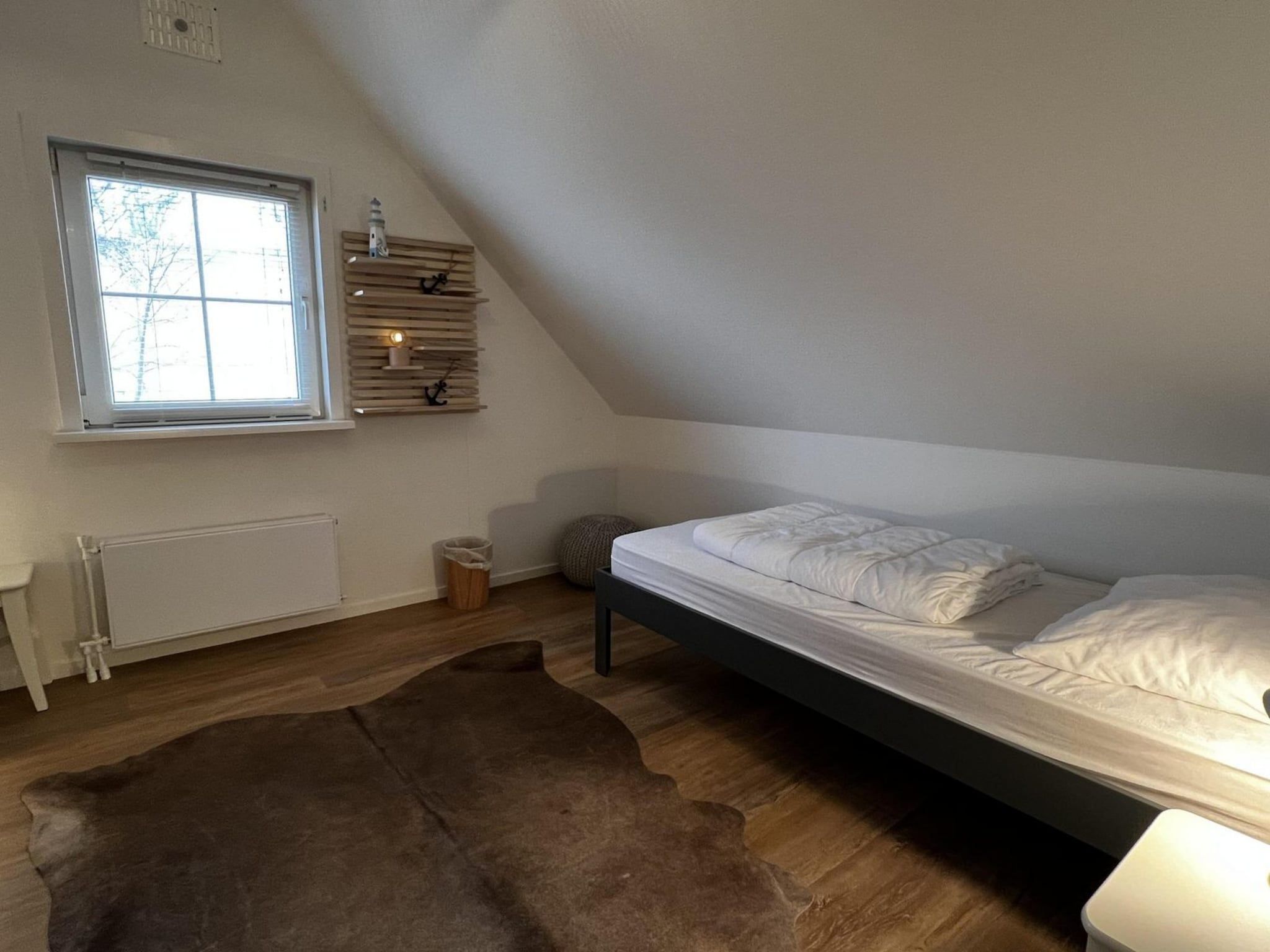Een slaapkamer van Anzelhoef 26 in Sint Maartenszee