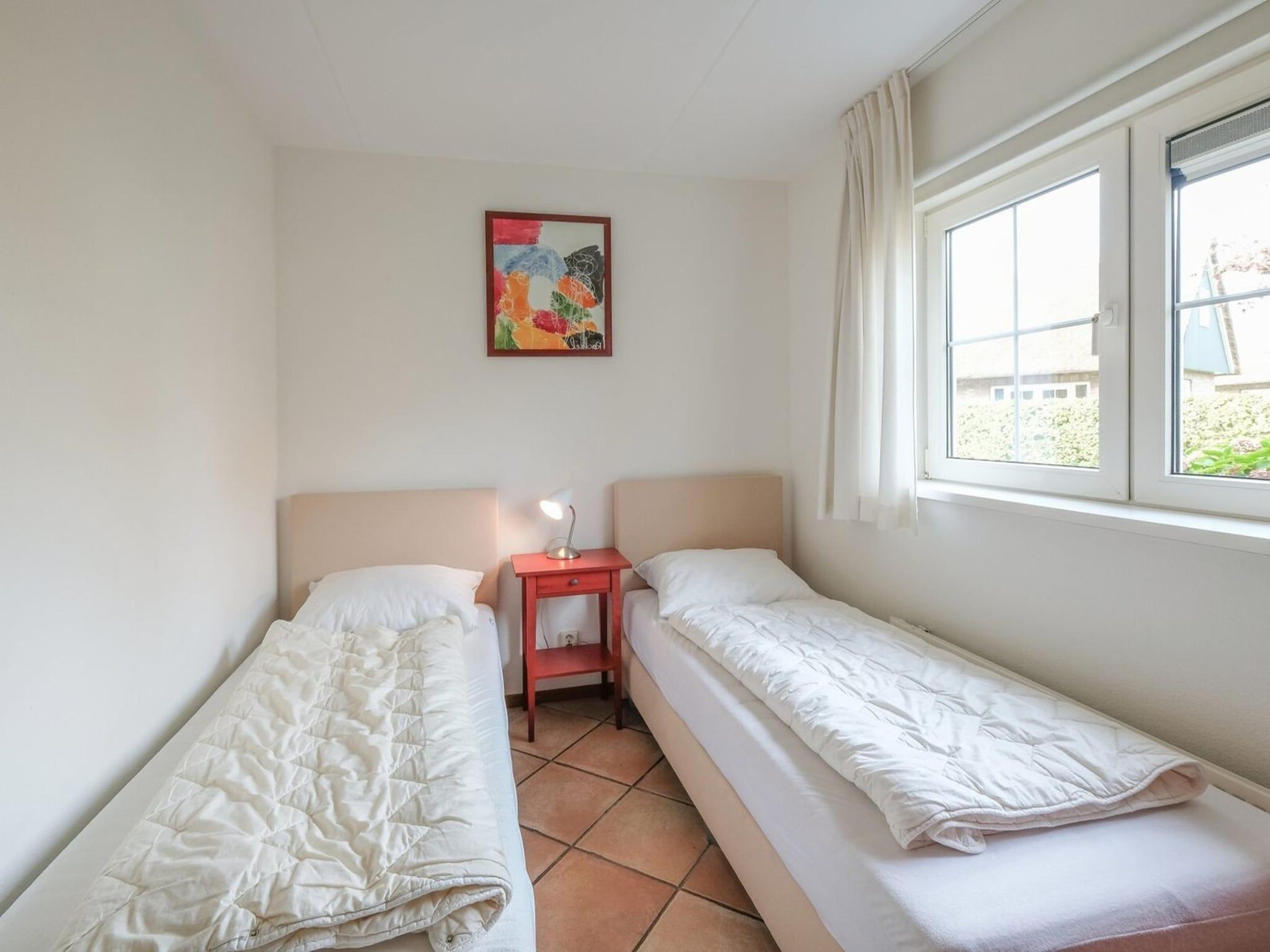 Een slaapkamer van Anzelhoef 30 in Sint Maartenszee