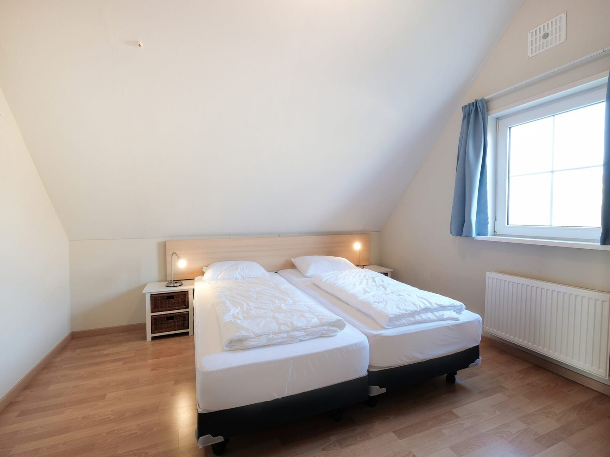 Een slaapkamer van Anzelhoef 31 in Sint Maartenszee