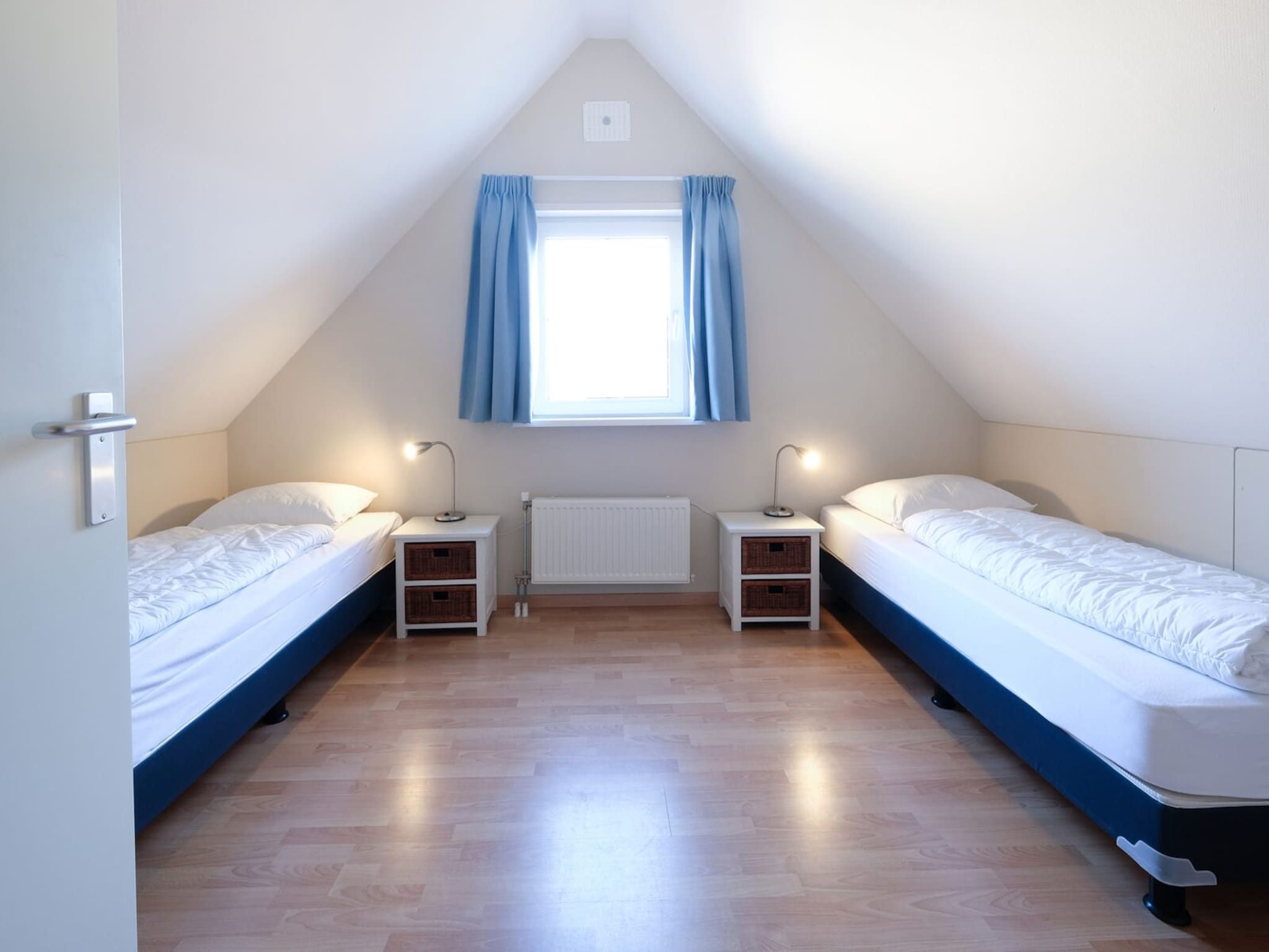 Een slaapkamer van Anzelhoef 31 in Sint Maartenszee