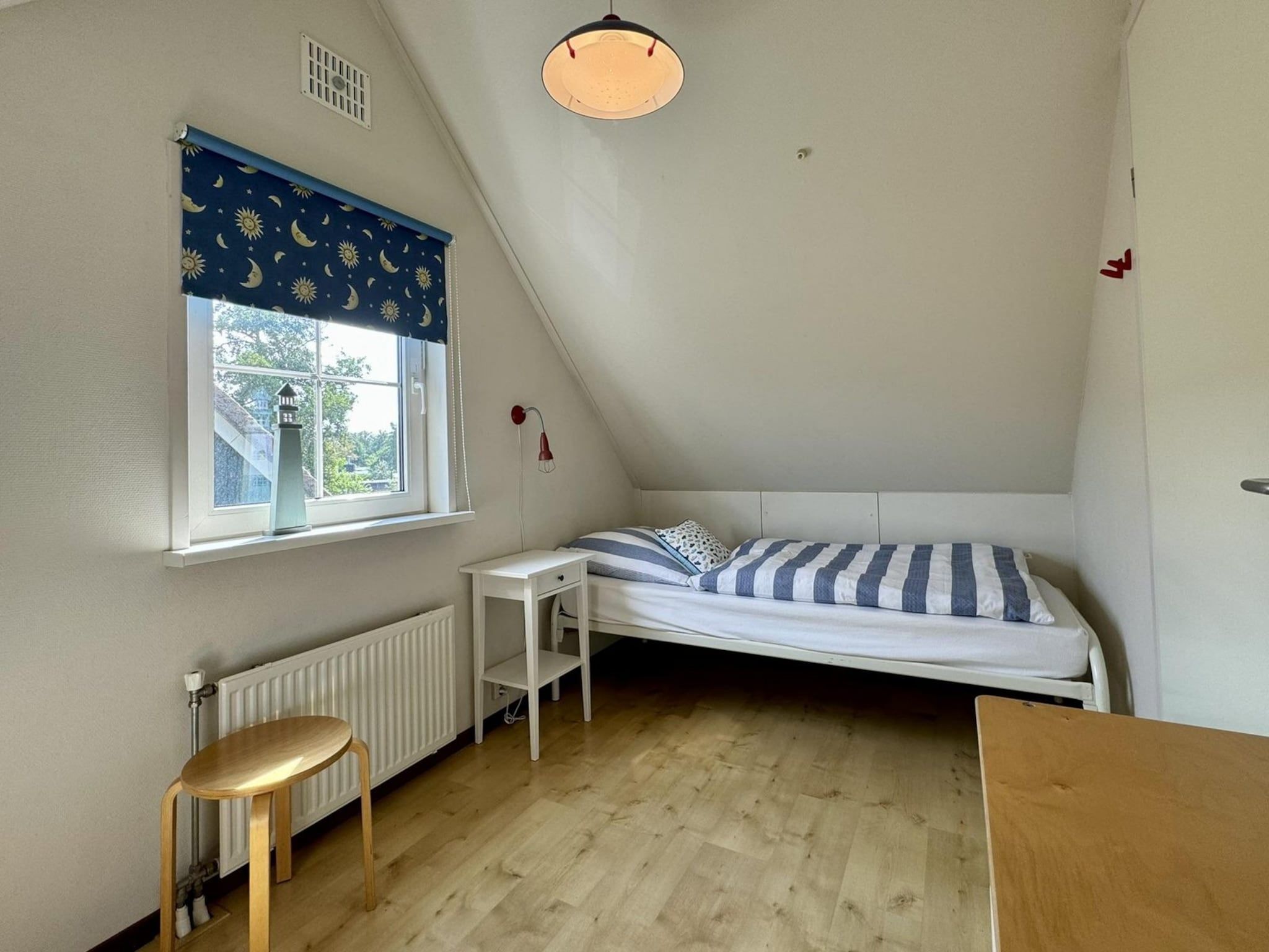Een slaapkamer van Anzelhoef 32 in Sint Maartenszee
