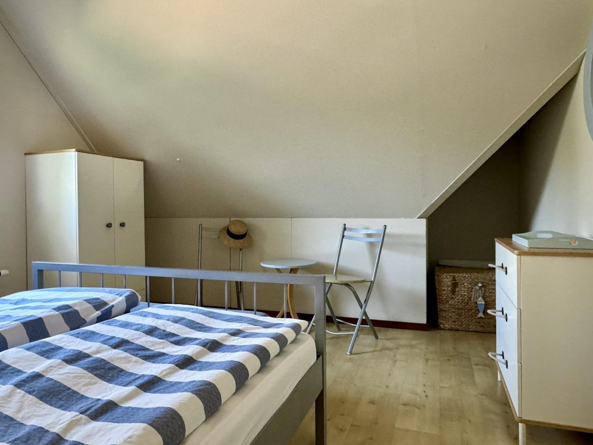 Een slaapkamer van Anzelhoef 32 in Sint Maartenszee