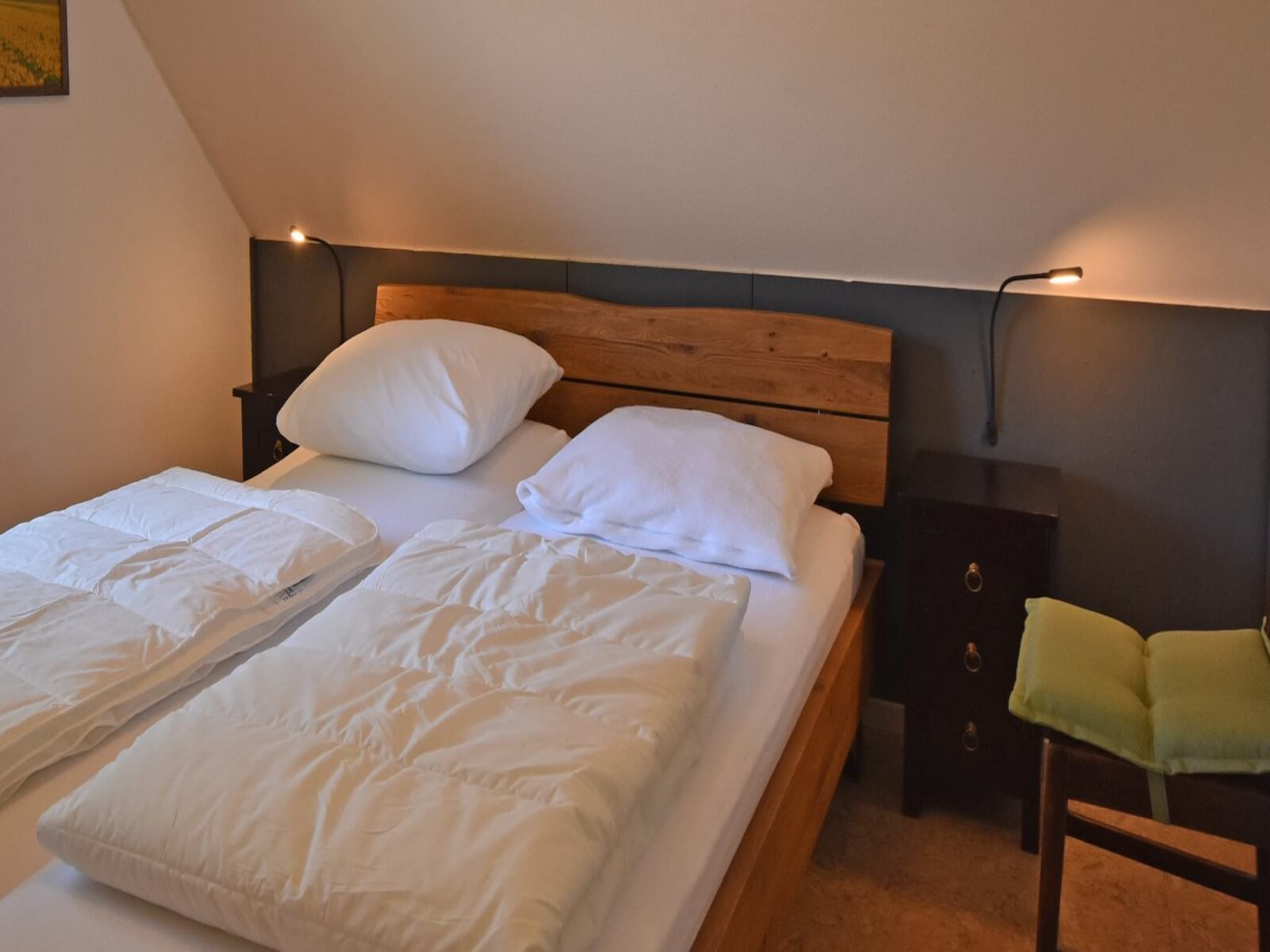 Een slaapkamer van Anzelhoef 11 in Sint Maartenszee