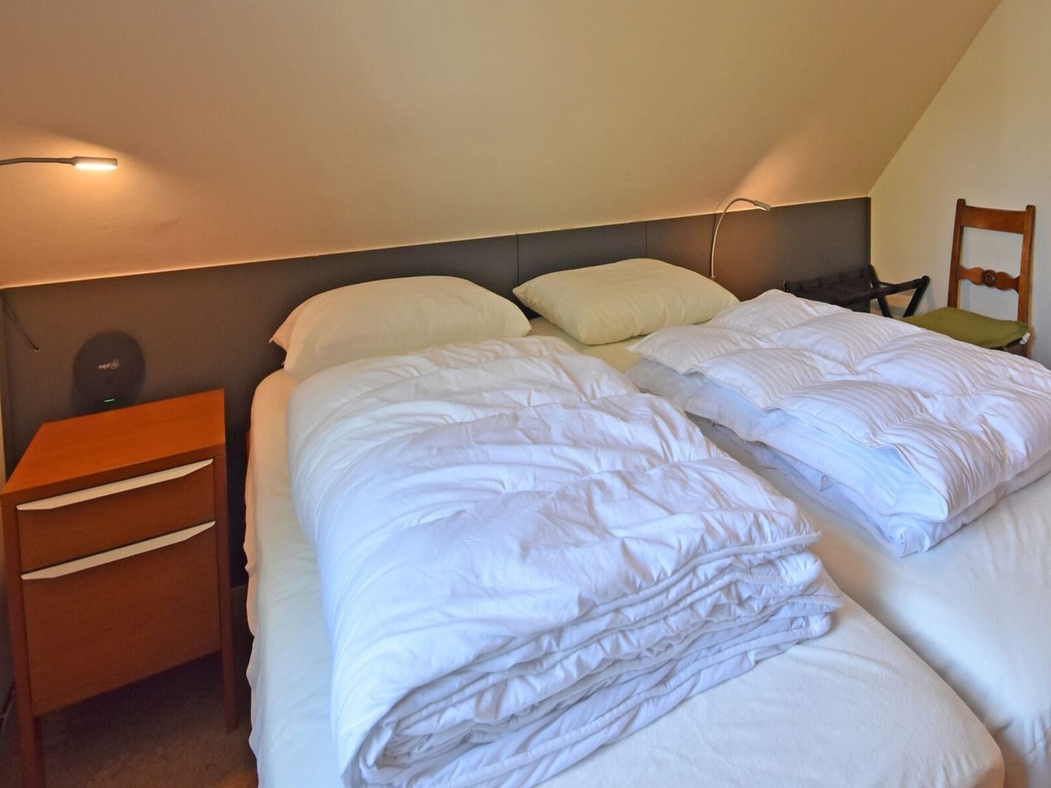 Een slaapkamer van Anzelhoef 11 in Sint Maartenszee