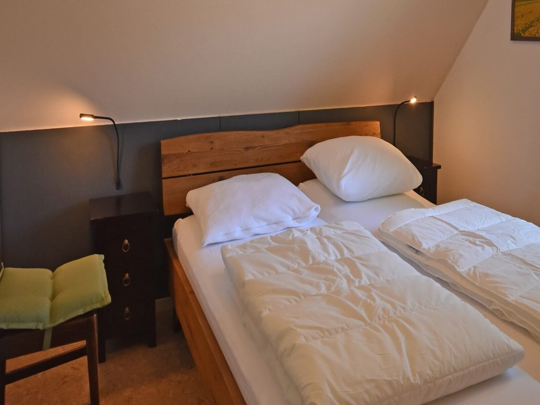 Een slaapkamer van Anzelhoef 11 in Sint Maartenszee
