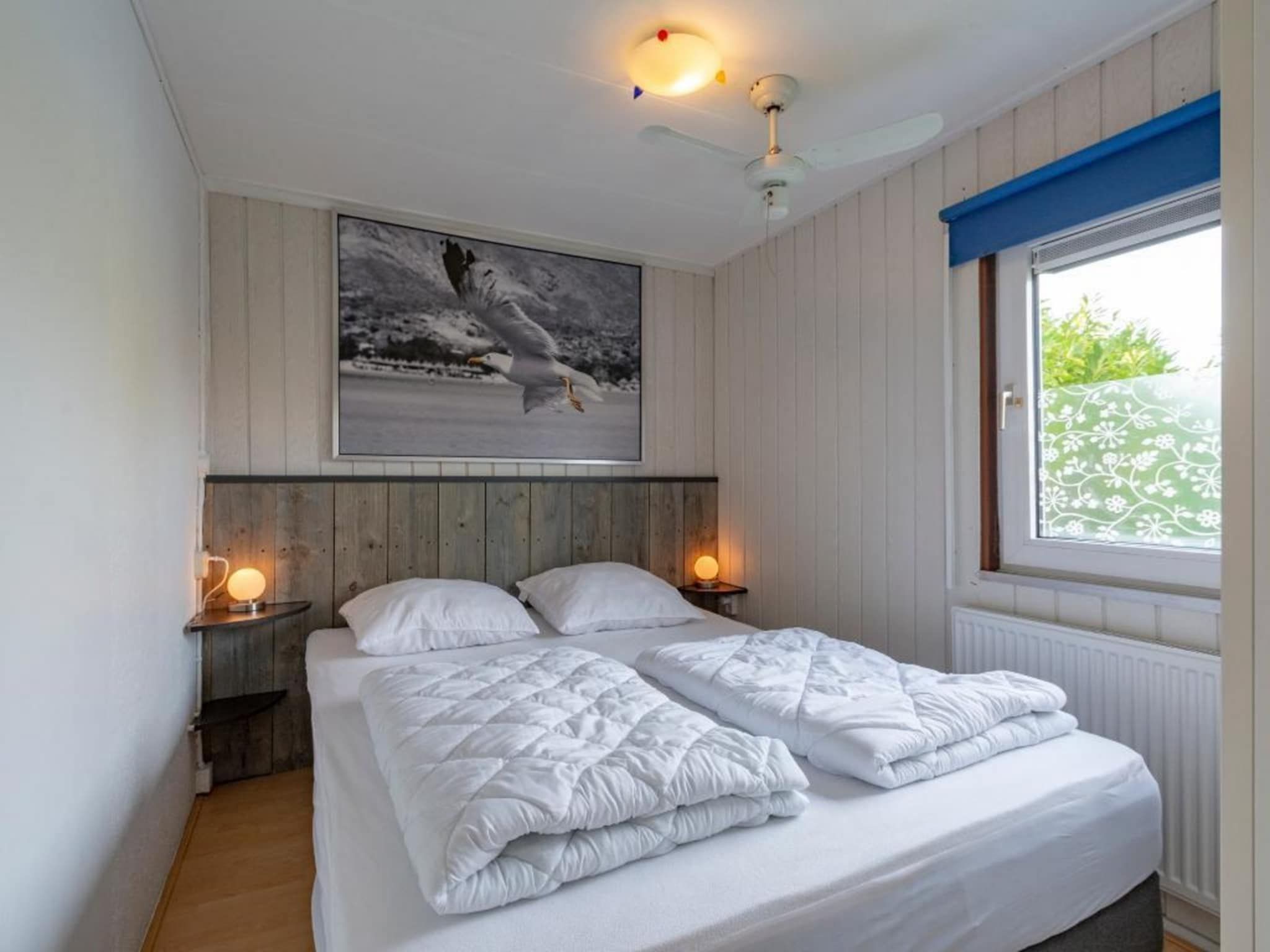 Een slaapkamer van Belkmerduinen 03 in Sint Maartenszee