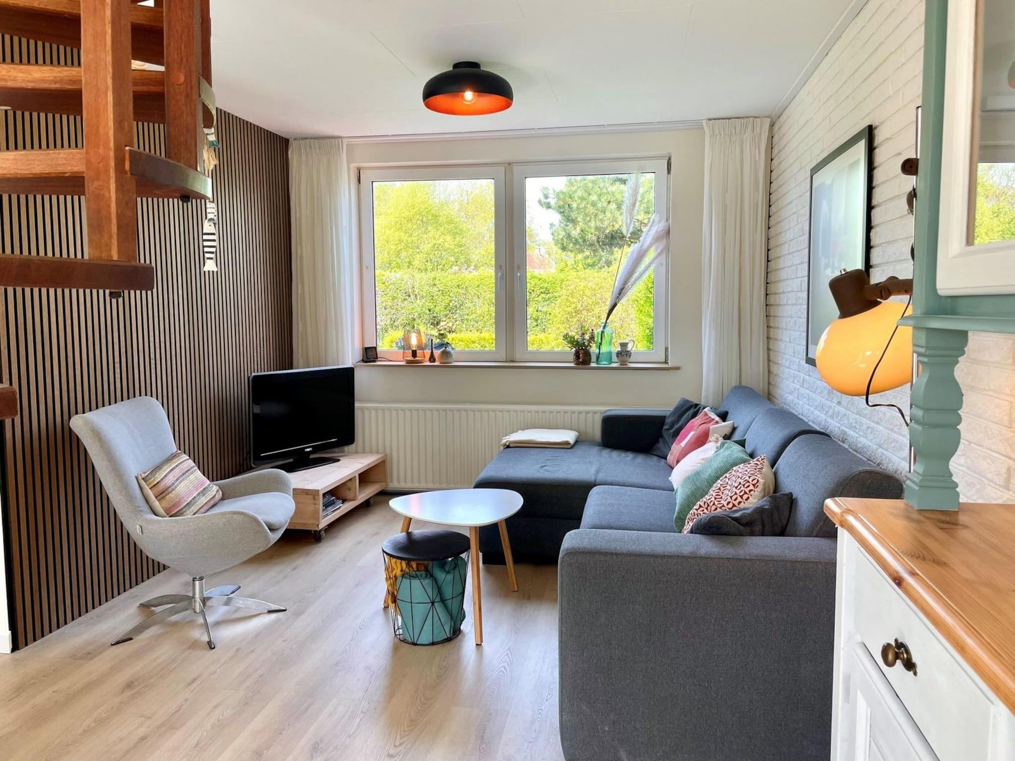 De woonkamer van Belkmerduinen 05 in Sint Maartenszee