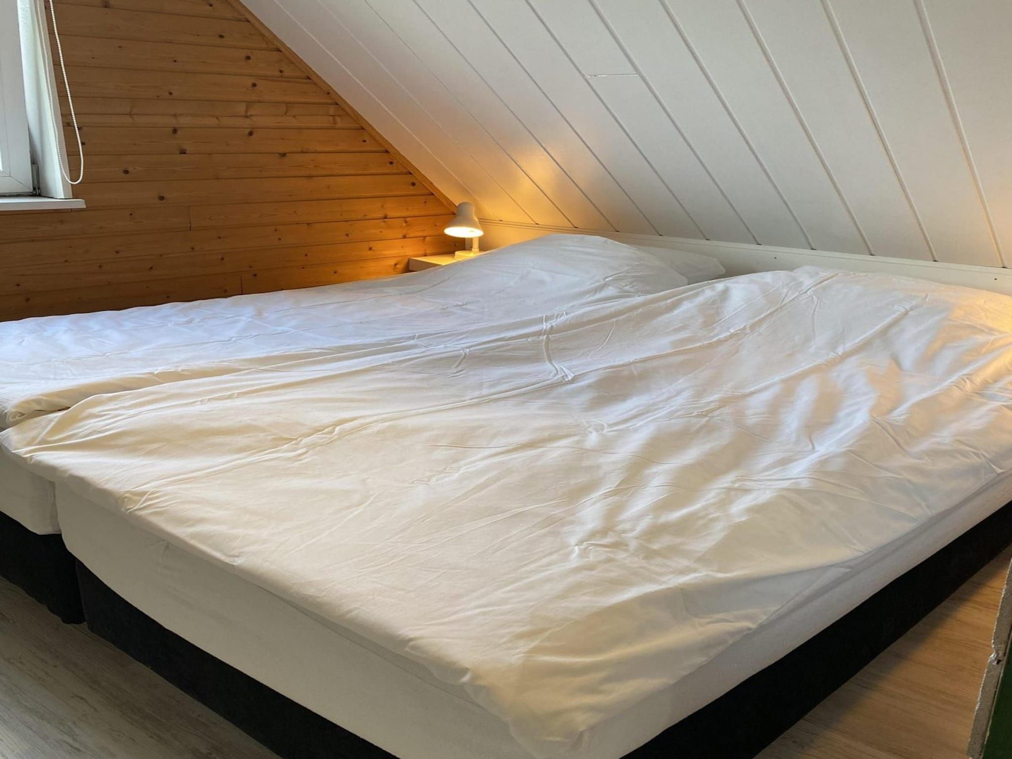 Een slaapkamer van Belkmerduinen 05 in Sint Maartenszee