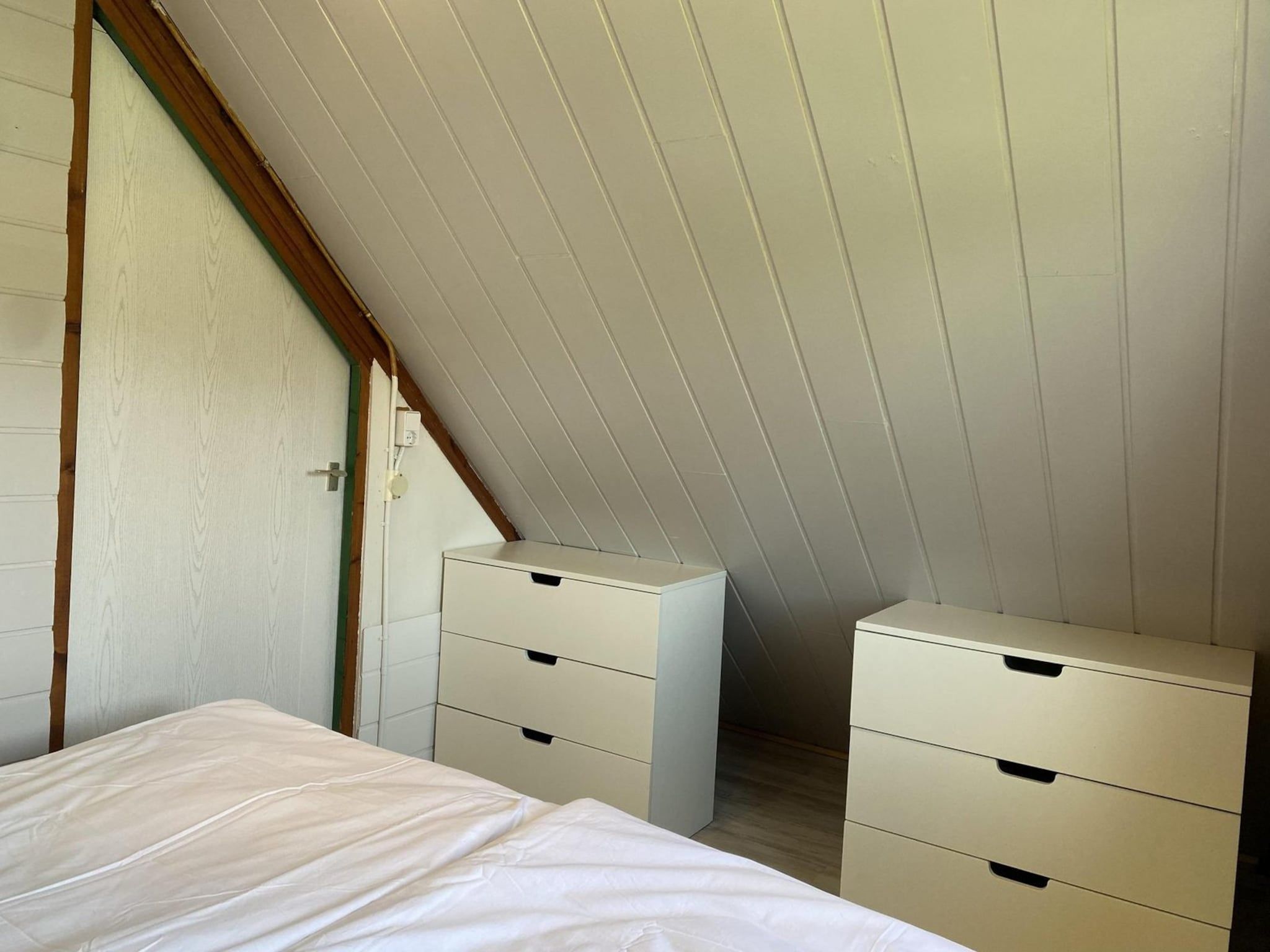 Een slaapkamer van Belkmerduinen 05 in Sint Maartenszee