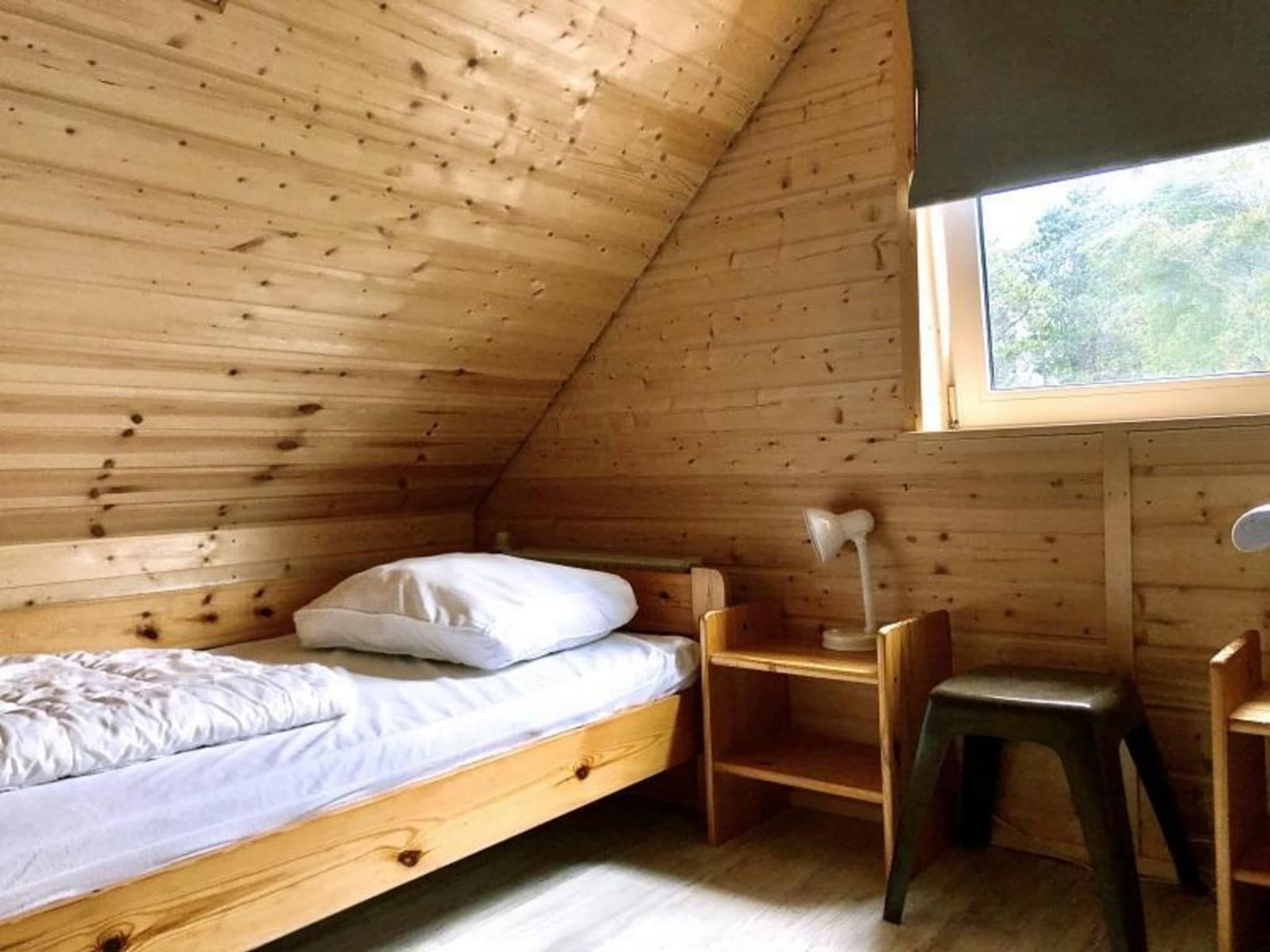 Een slaapkamer van Belkmerduinen 05 in Sint Maartenszee