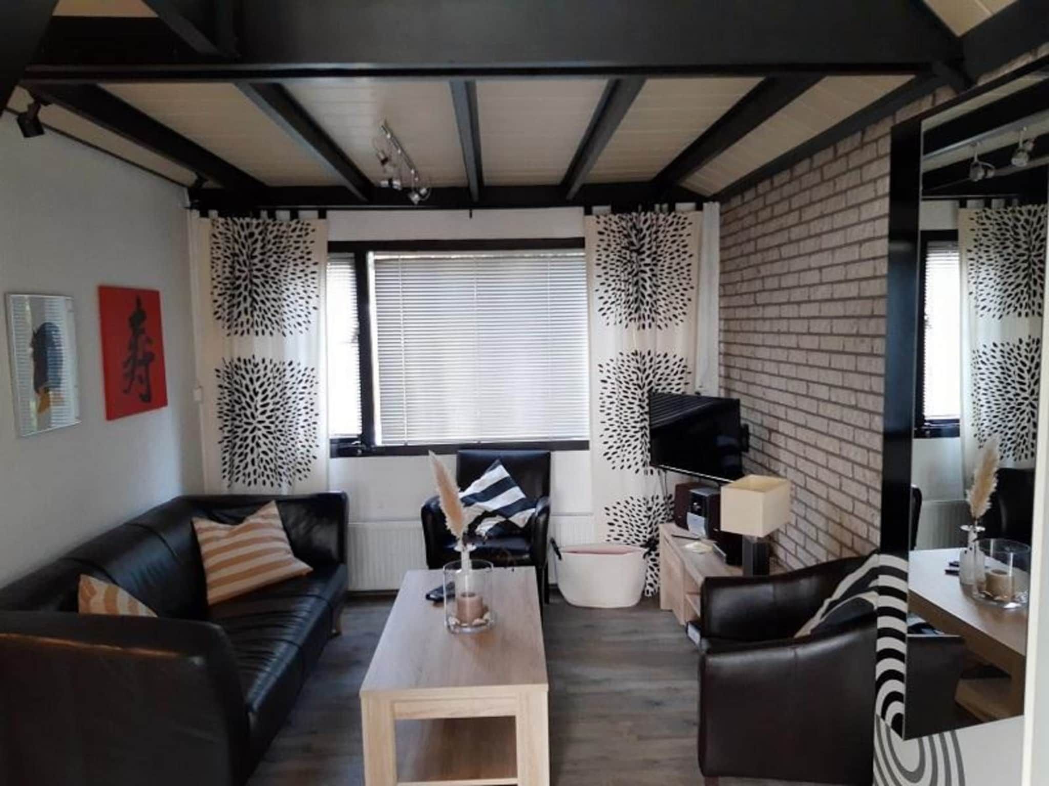 De woonkamer van Belkmerduinen 23 in Sint Maartenszee