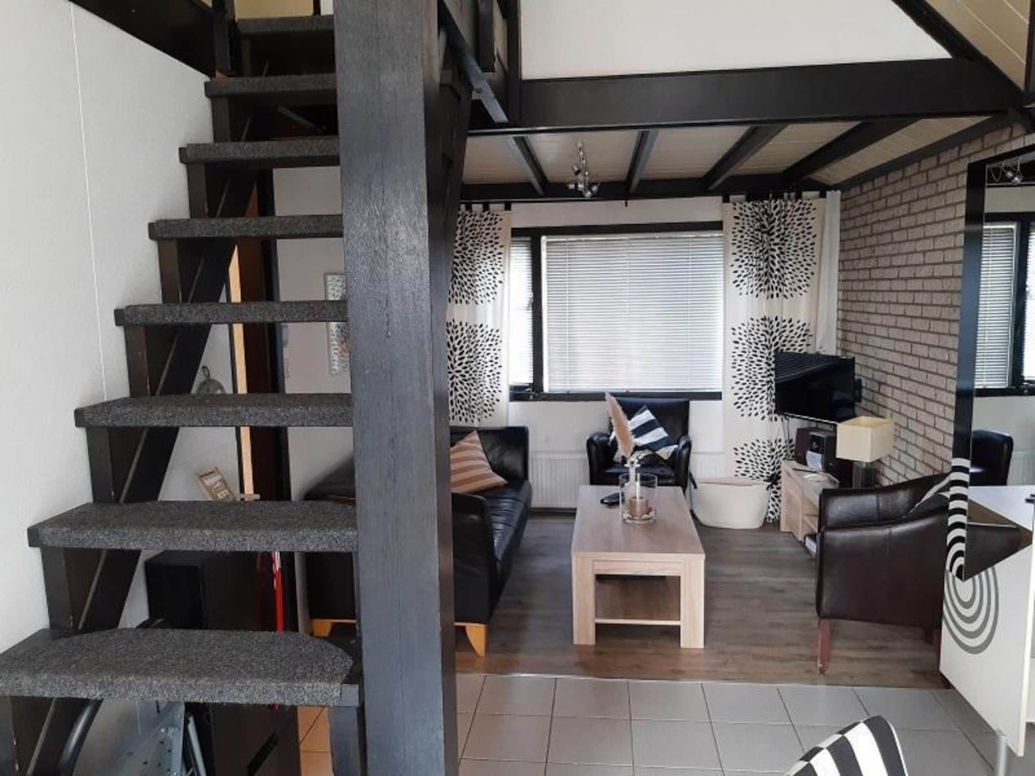 De woonkamer van Belkmerduinen 23 in Sint Maartenszee