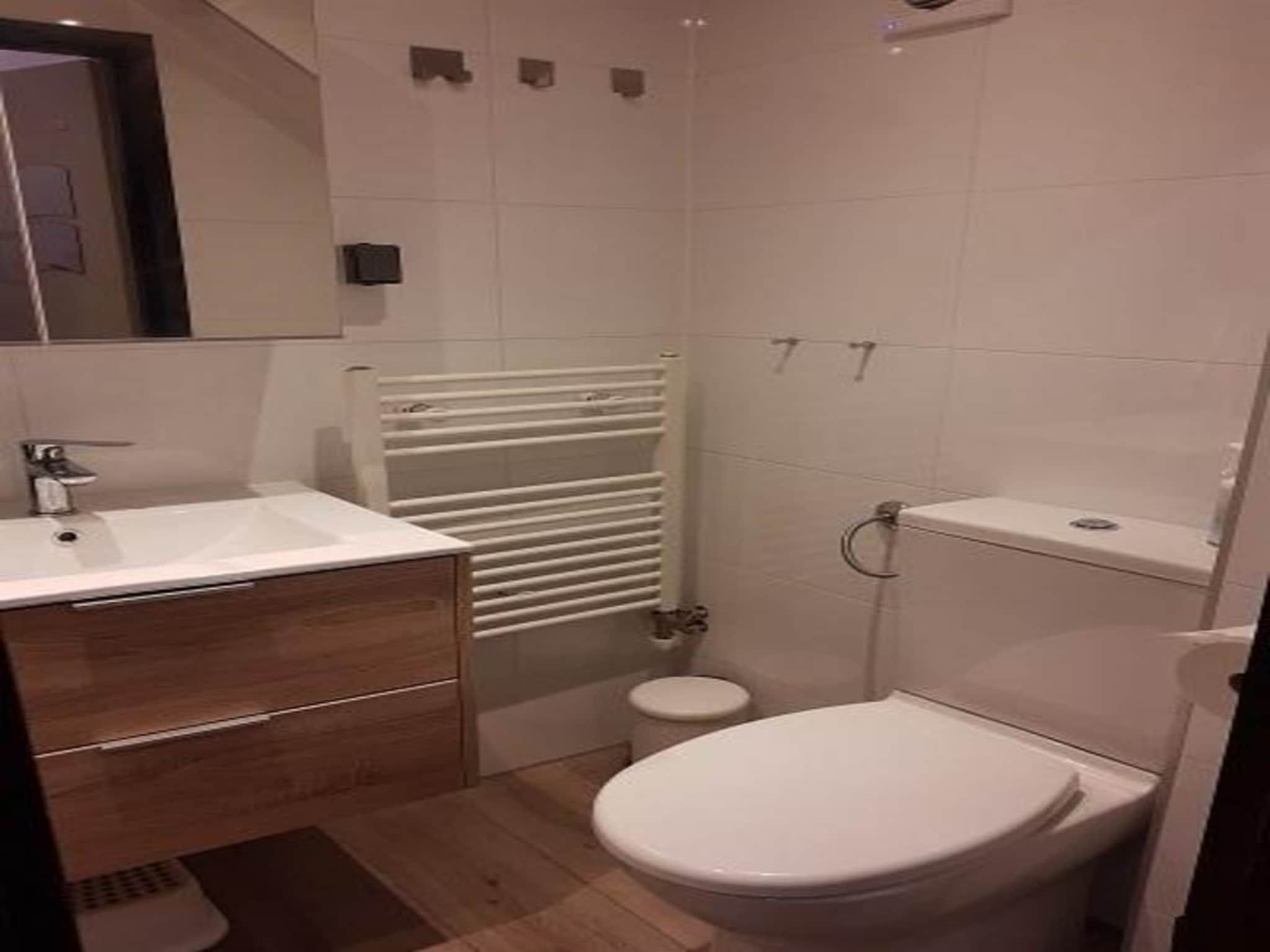 De badkamer van Belkmerduinen 23 in Sint Maartenszee