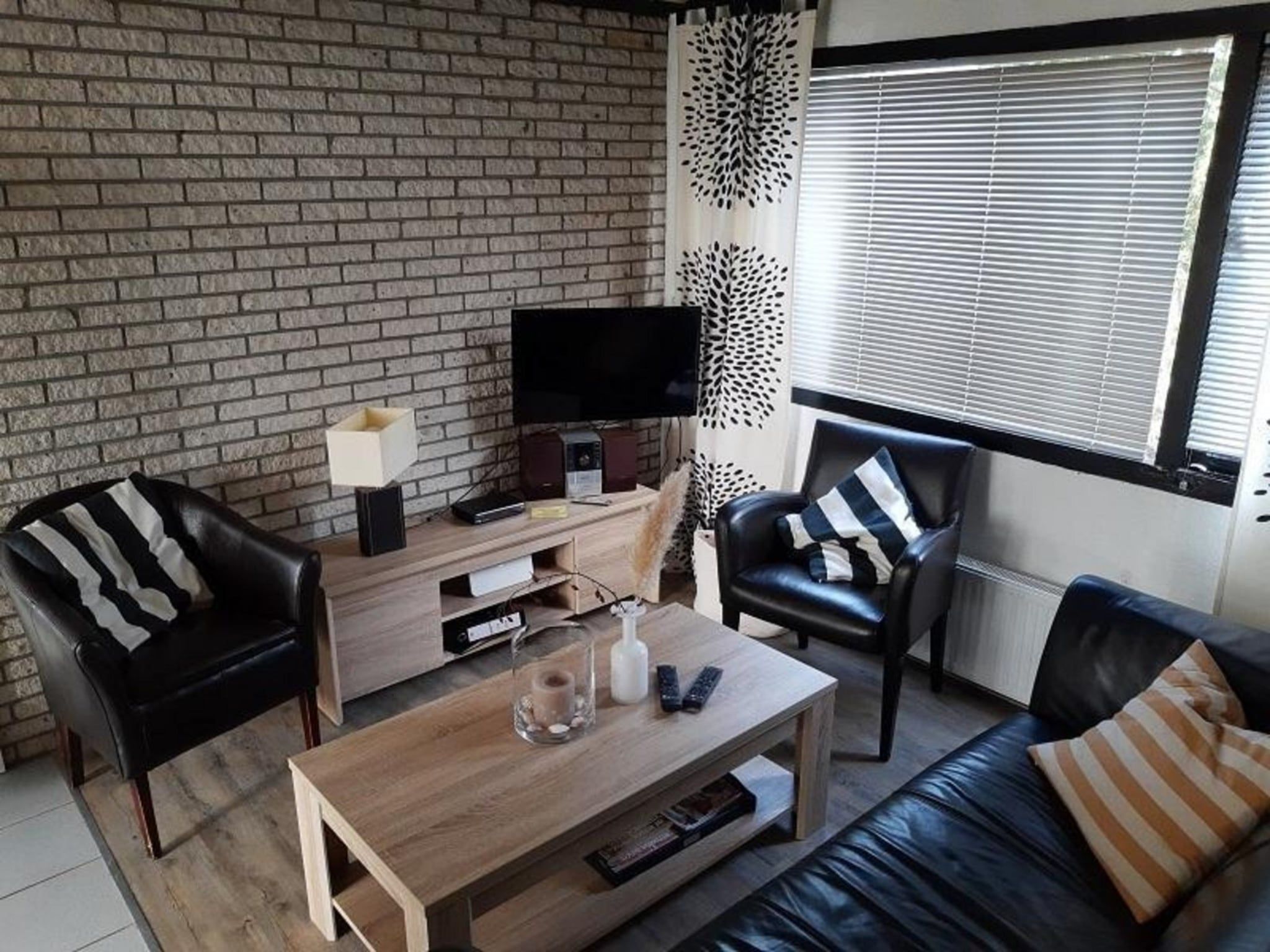 De buitenkant van Belkmerduinen 23 in Sint Maartenszee