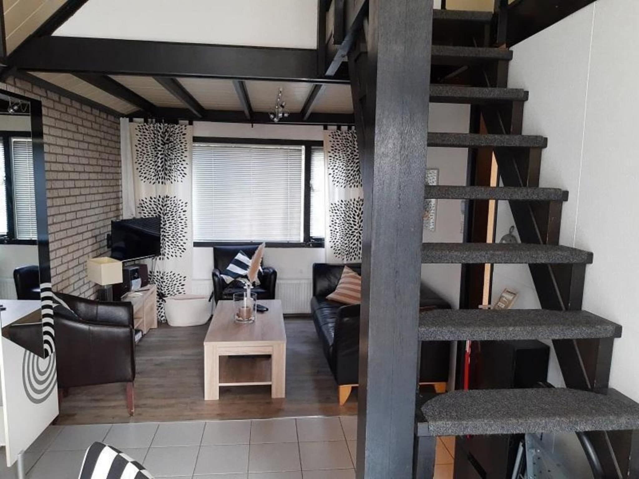 Een slaapkamer van Belkmerduinen 23 in Sint Maartenszee