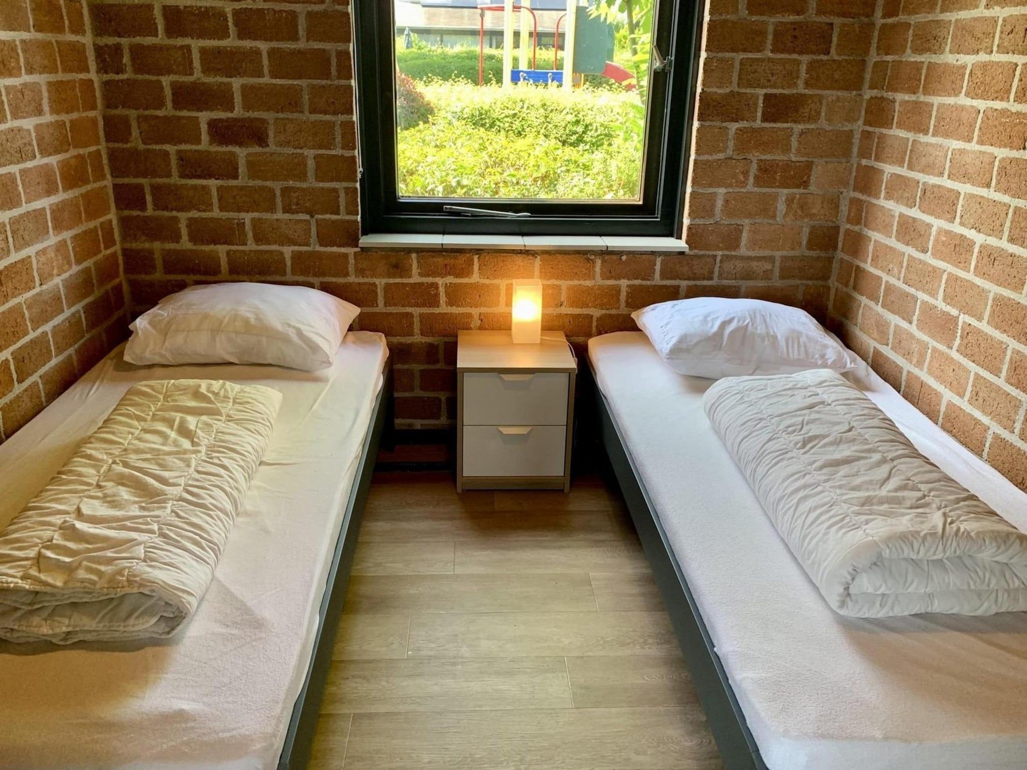 Een slaapkamer van Boerenslag 23 in Sint Maartenszee