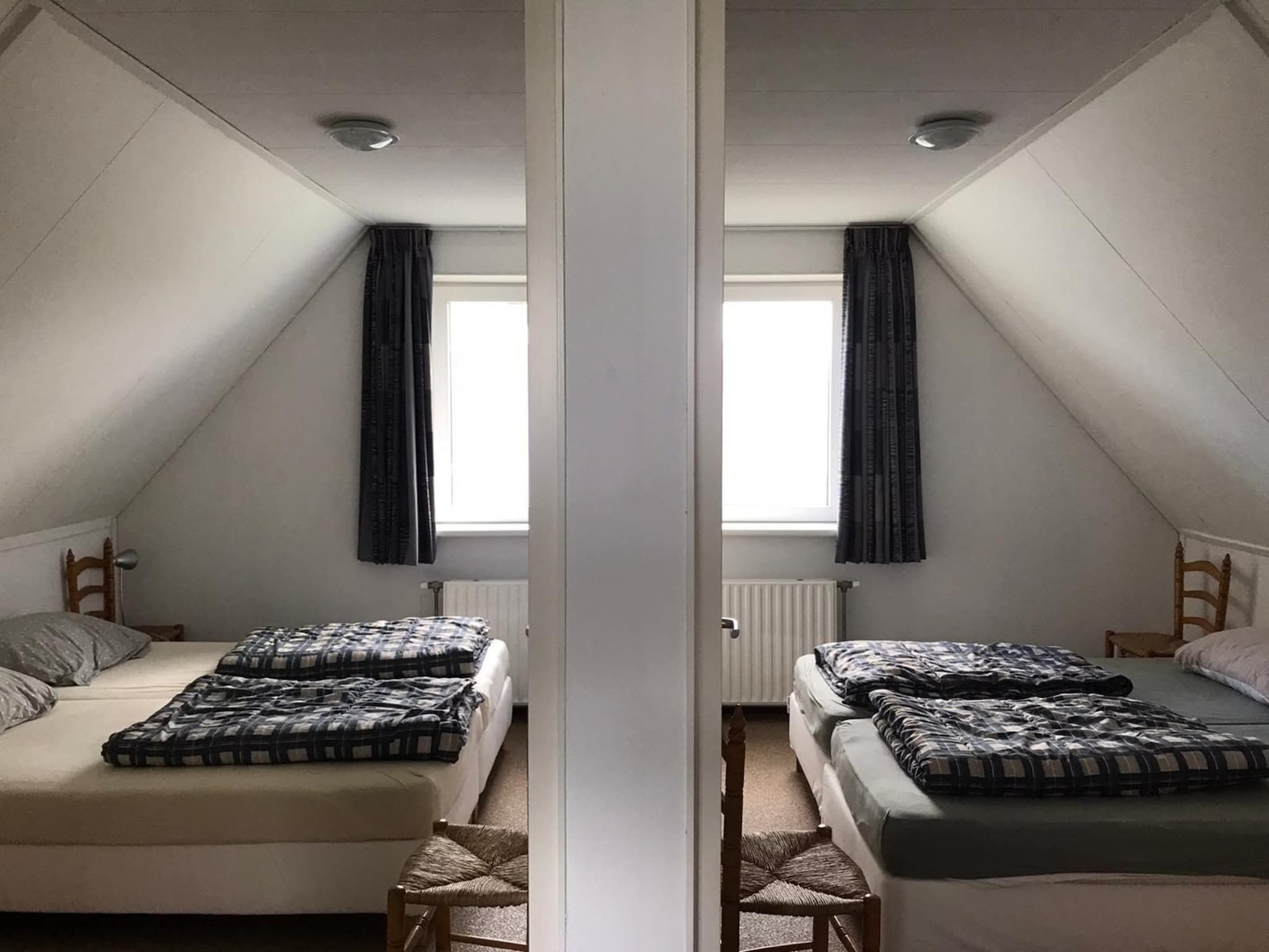 Een slaapkamer van Bohemien 27 in Sint Maartenszee