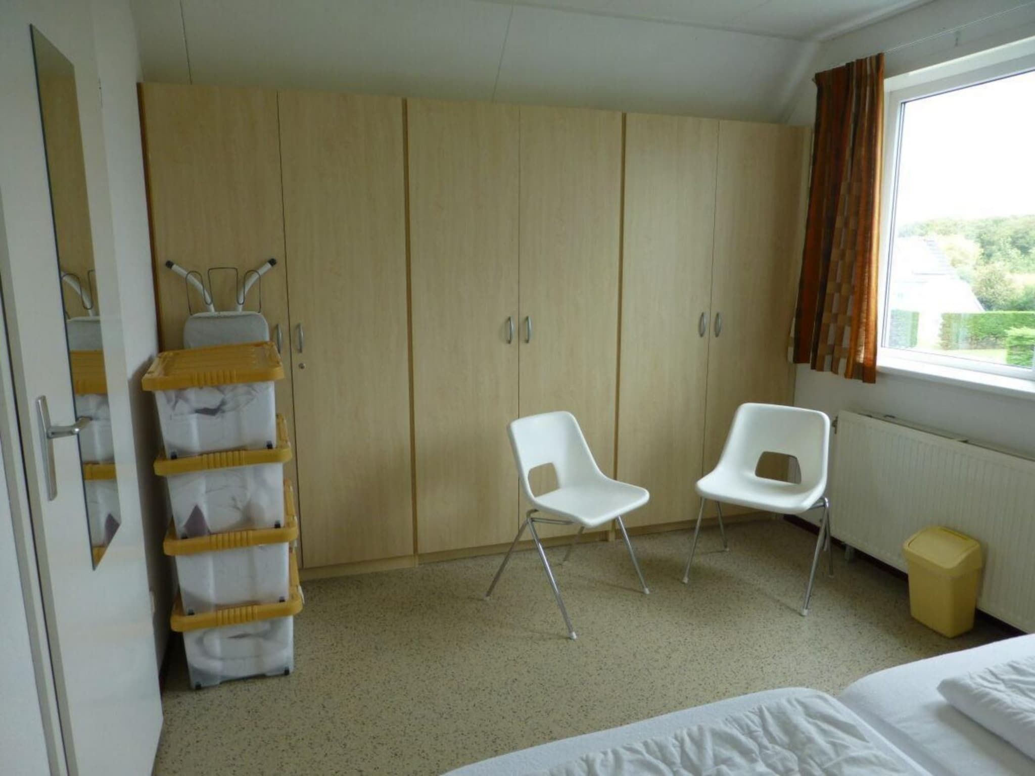 Een slaapkamer van Bohemien 47 in Sint Maartenszee