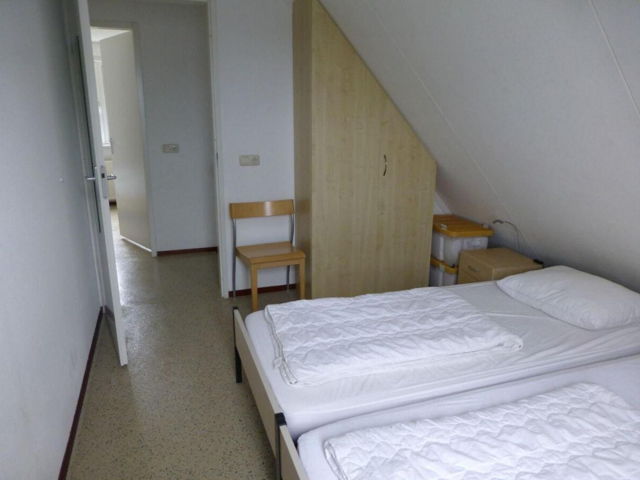 Een slaapkamer van Bohemien 47 in Sint Maartenszee