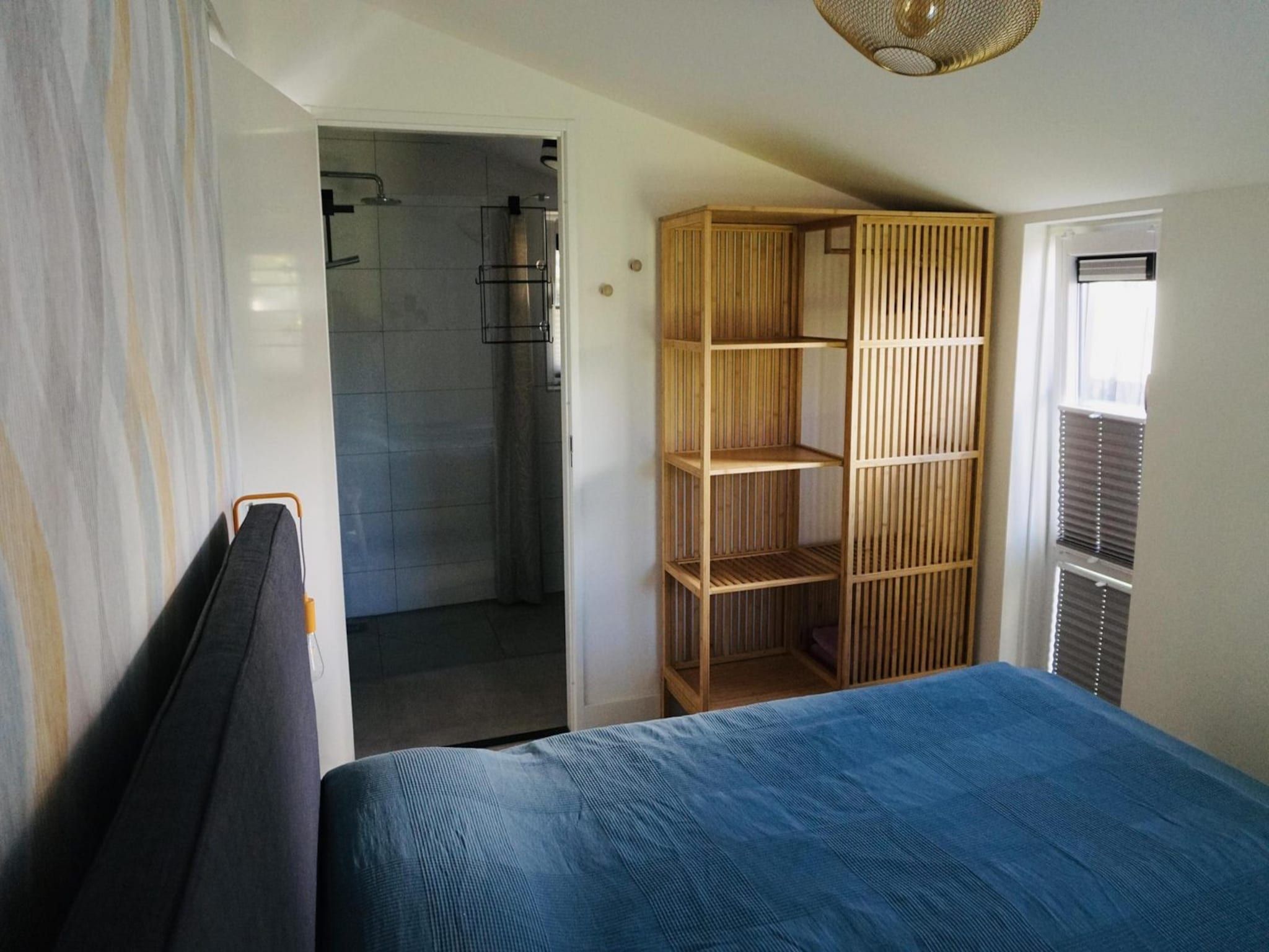 Een slaapkamer van De Wielen 73 in Sint Maarten