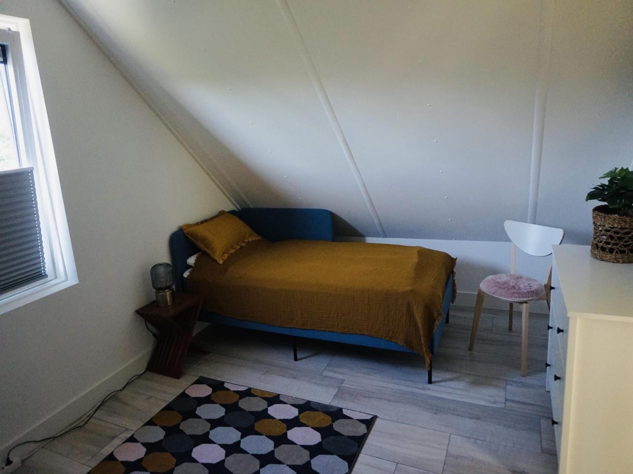 Een slaapkamer van De Wielen 73 in Sint Maarten