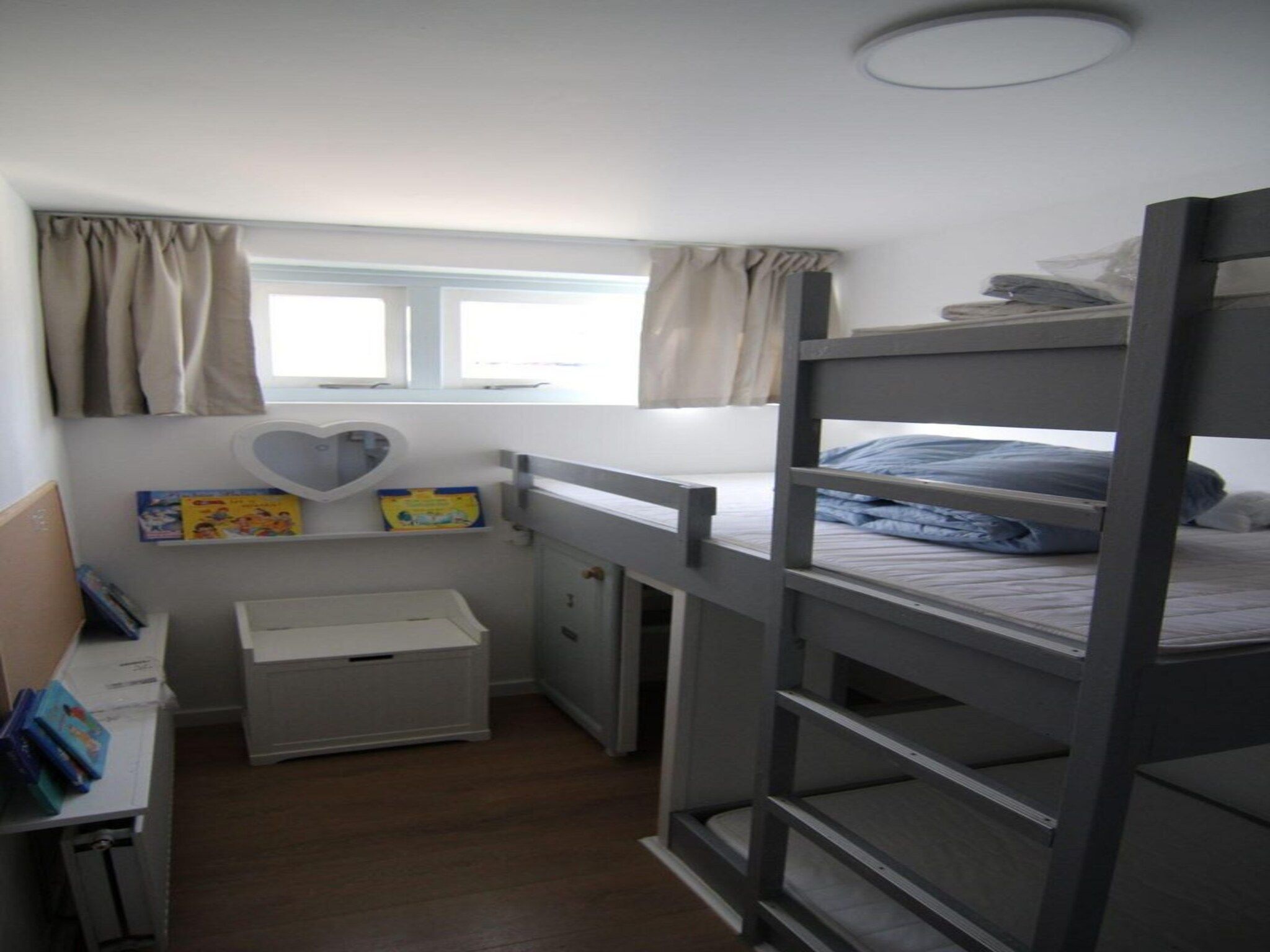 Een slaapkamer van Duinland 248 in Sint Maartenszee