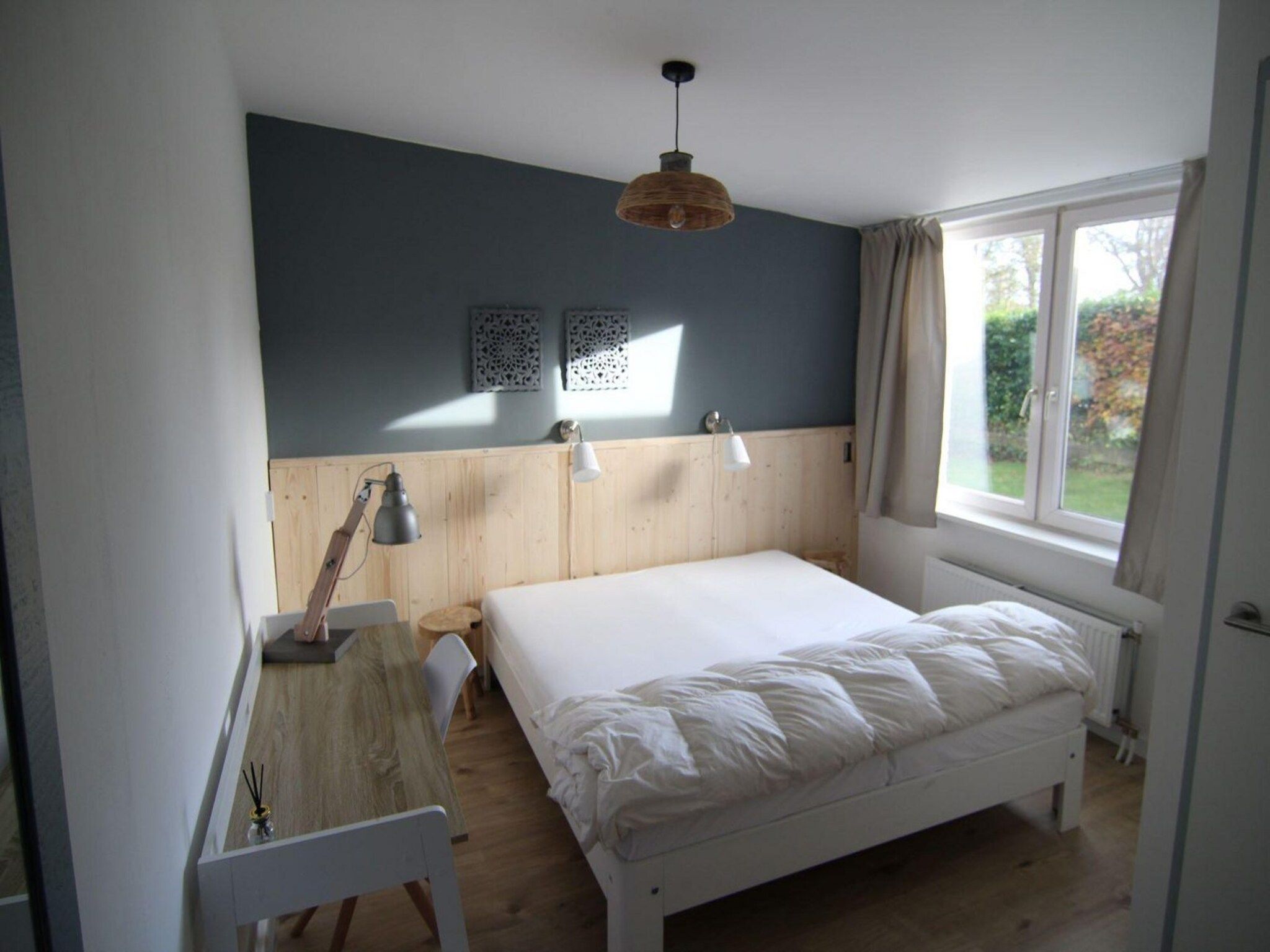 Een slaapkamer van Duinland 248 in Sint Maartenszee