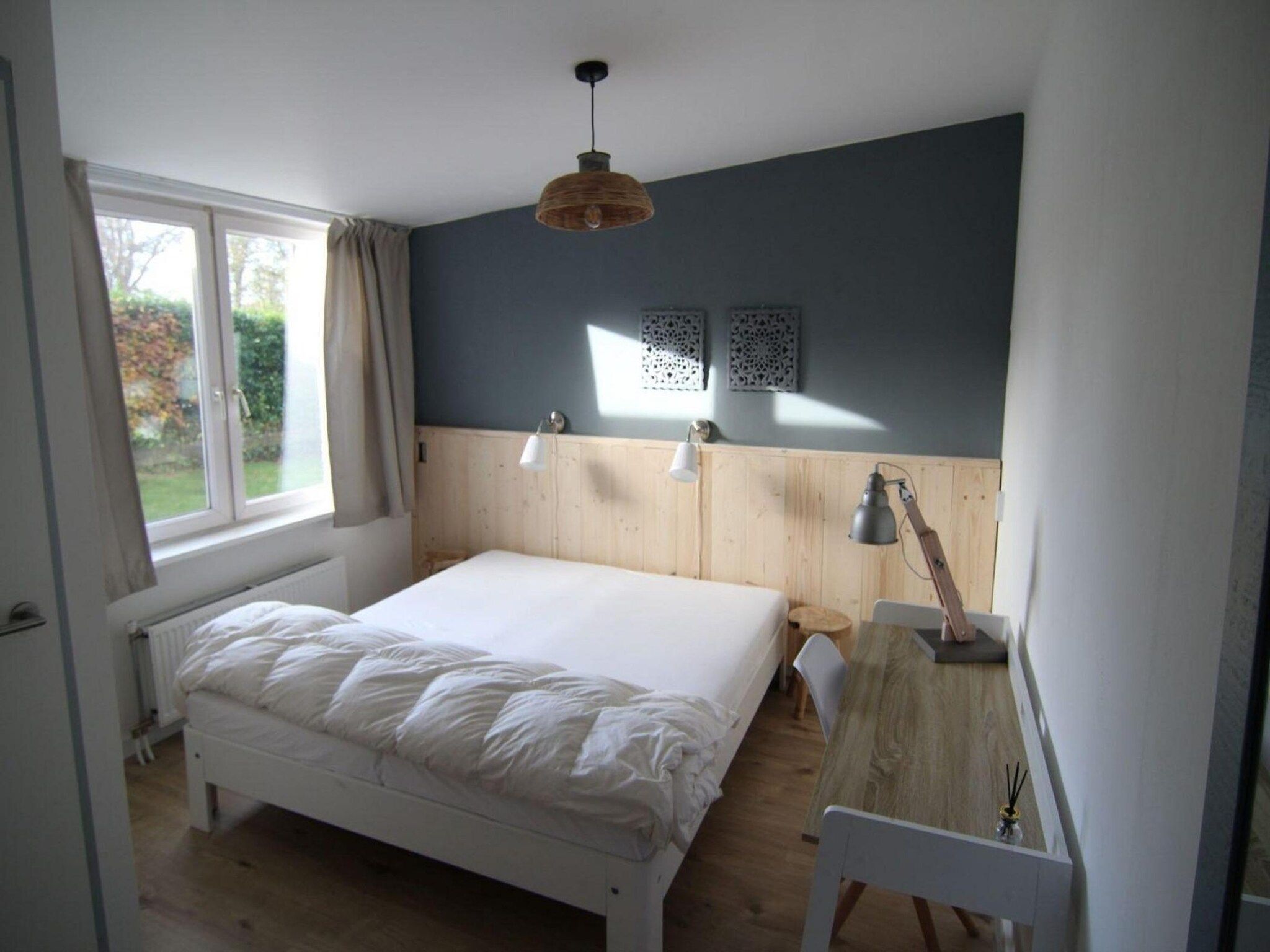 Een slaapkamer van Duinland 248 in Sint Maartenszee