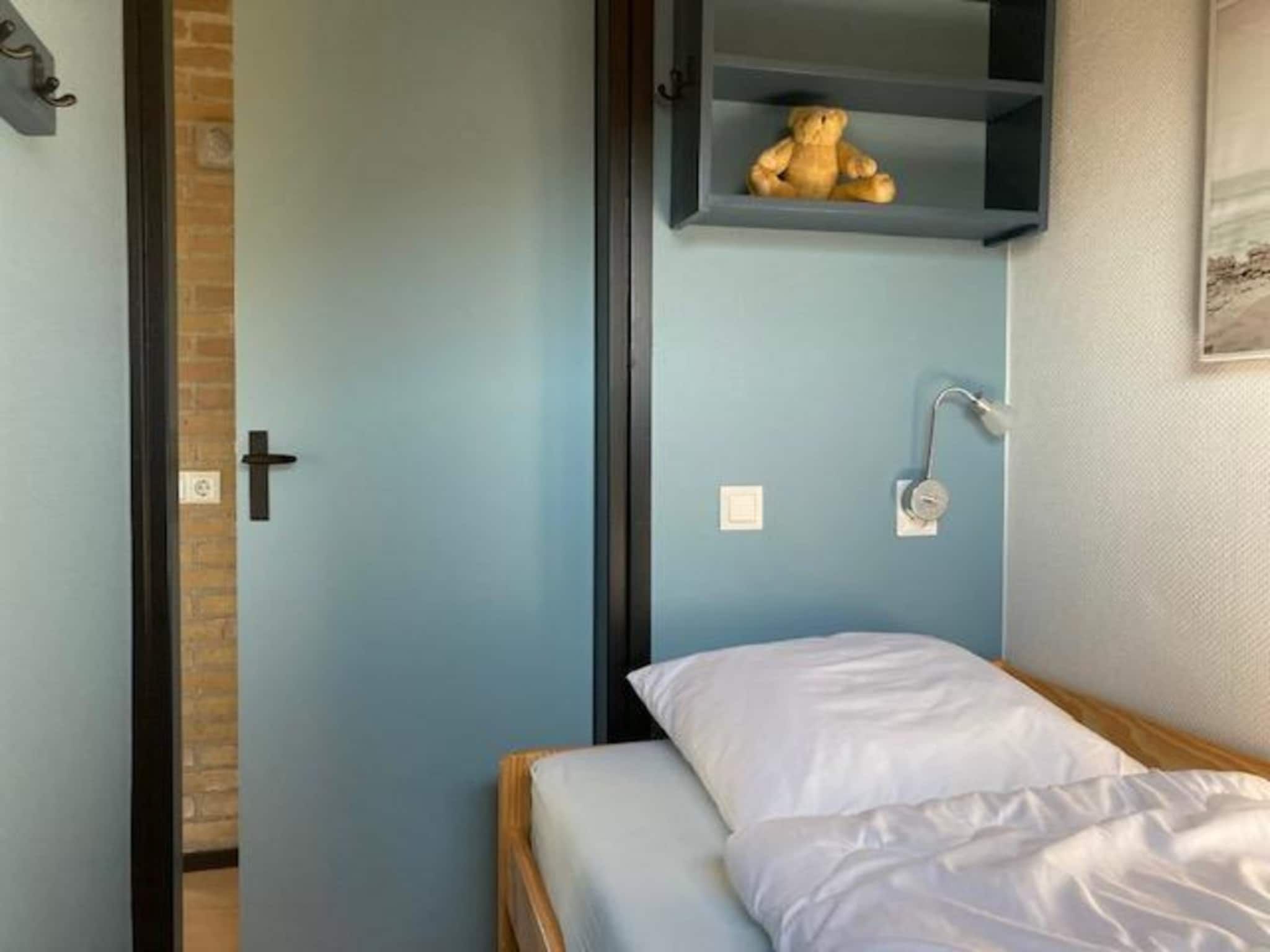 Een slaapkamer van De Schelp 07 in Sint Maartenszee