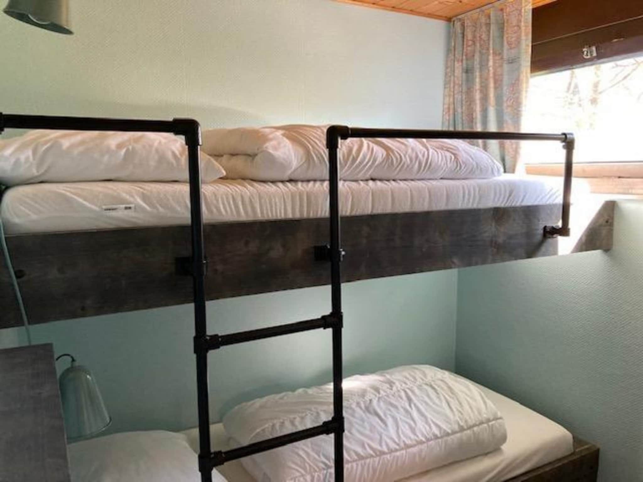 Een slaapkamer van De Schelp 07 in Sint Maartenszee