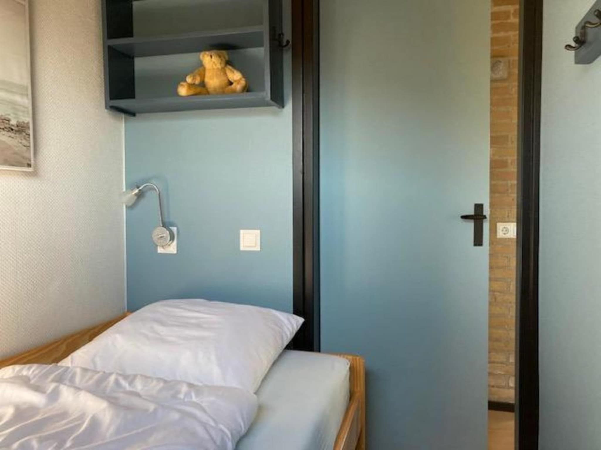 Een slaapkamer van De Schelp 07 in Sint Maartenszee