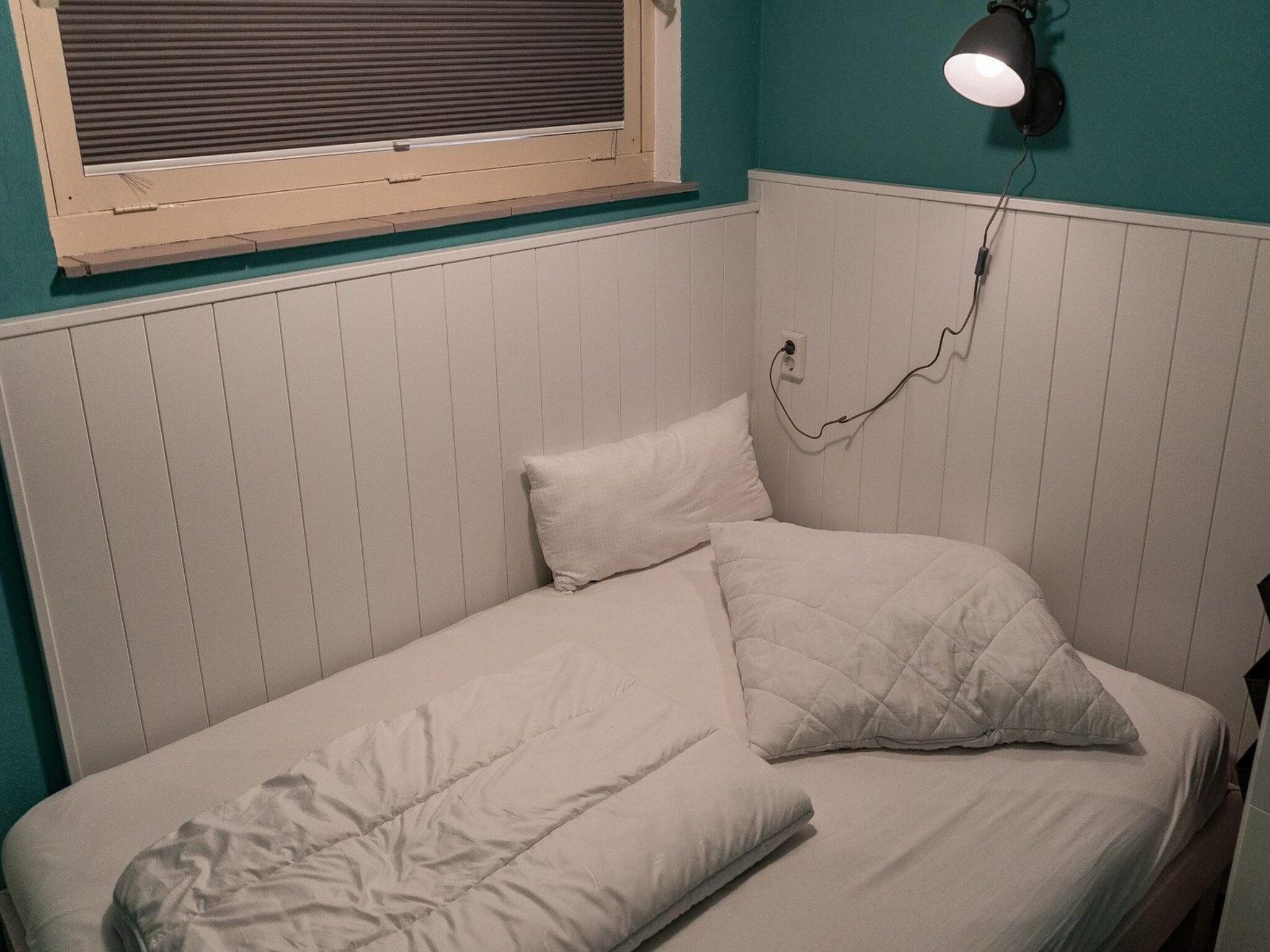 Een slaapkamer van De Schelp 08 in Sint Maartenszee