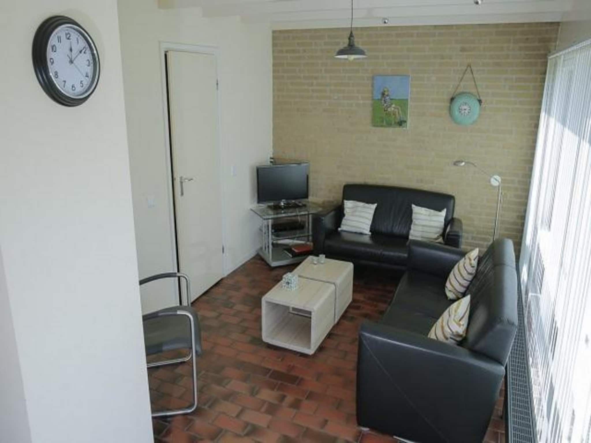 De woonkamer van De Schelp 14 in Sint Maartenszee