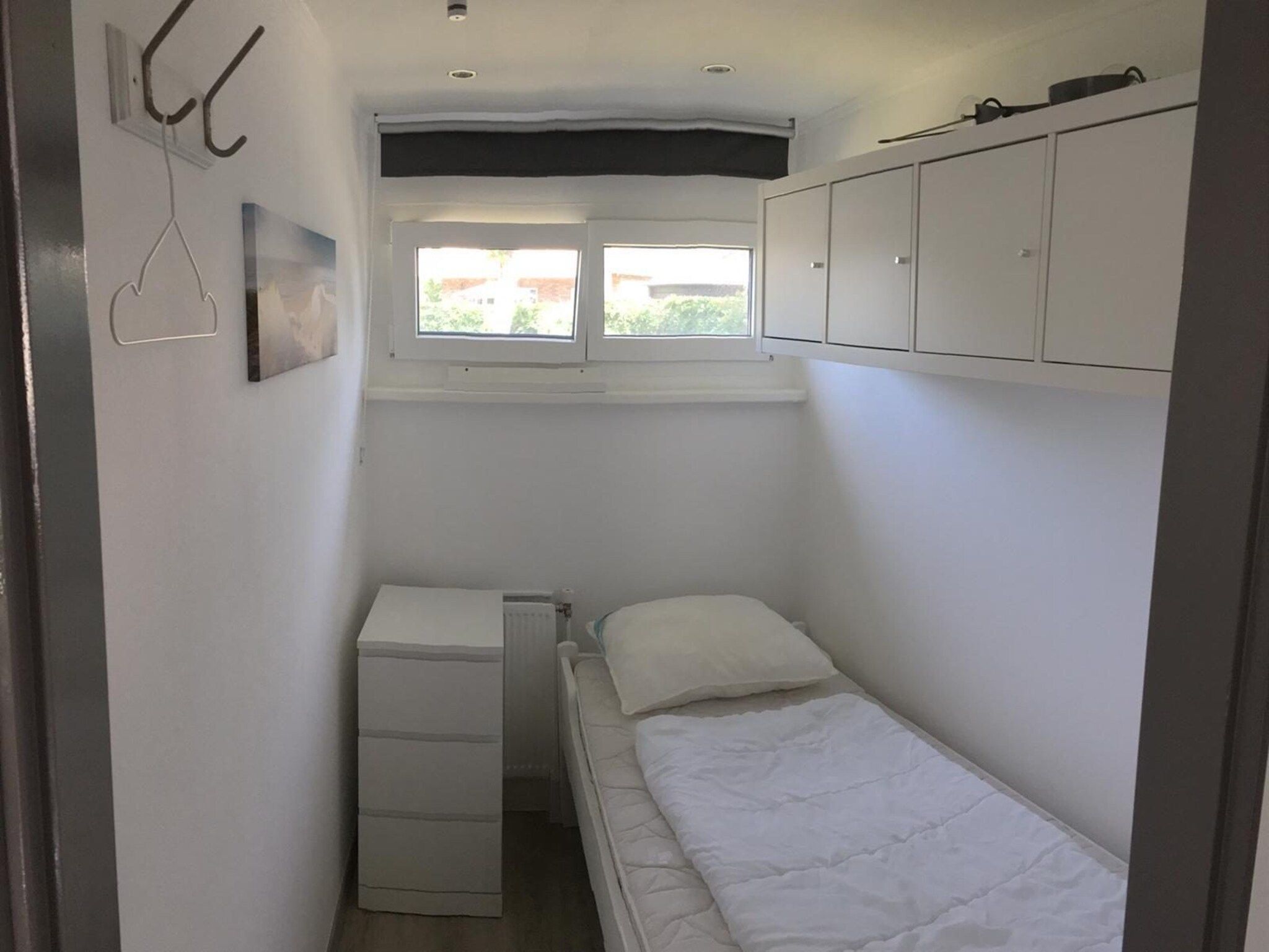 Een slaapkamer van De Schelp 24 in Sint Maartenszee